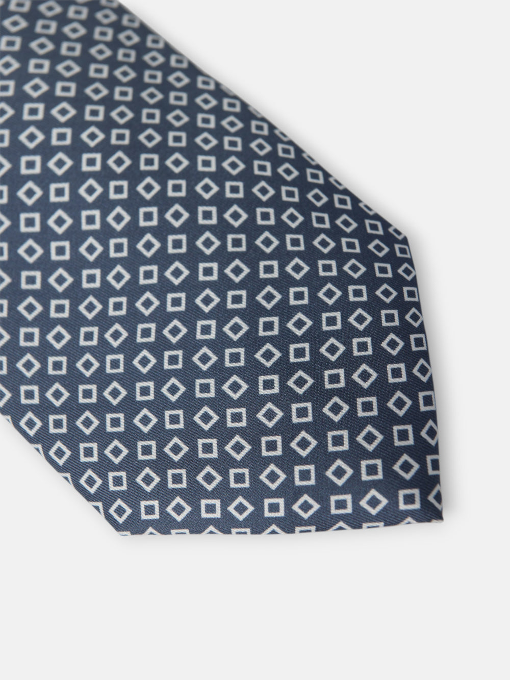 Navy blue tie with irregular check pattern
