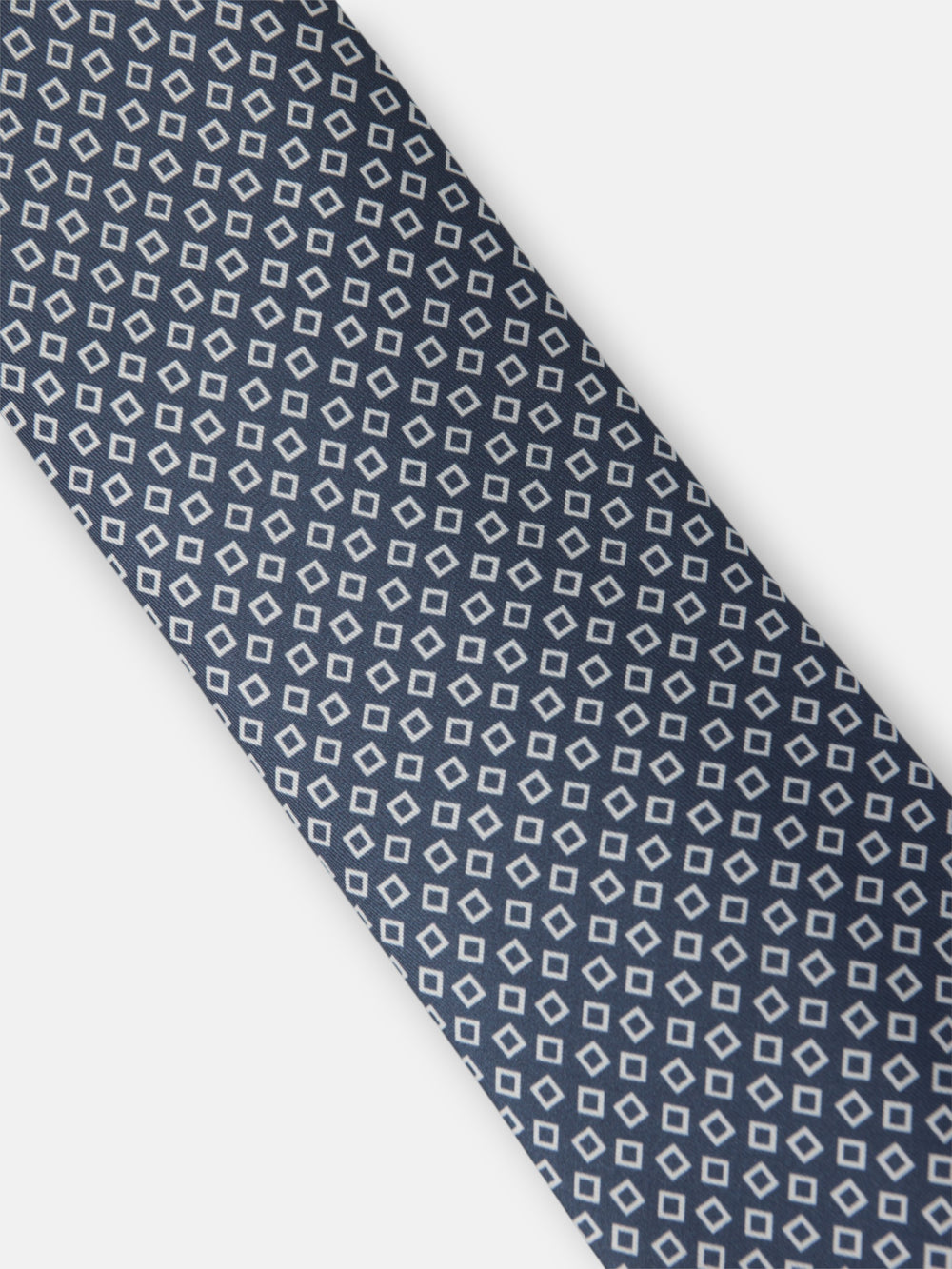 Navy blue tie with irregular check pattern
