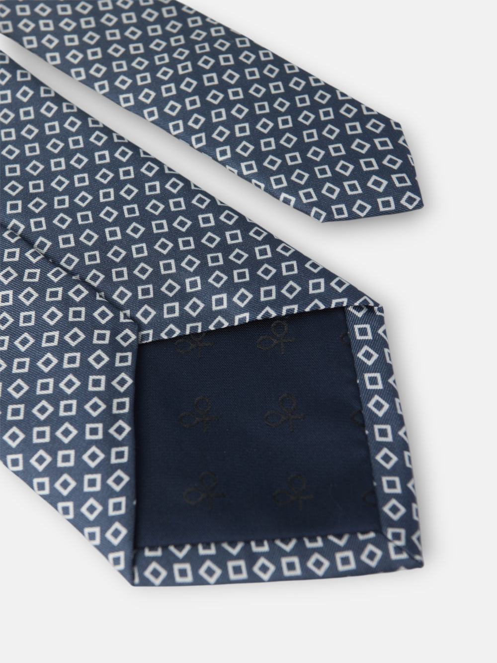 Navy blue tie with irregular check pattern