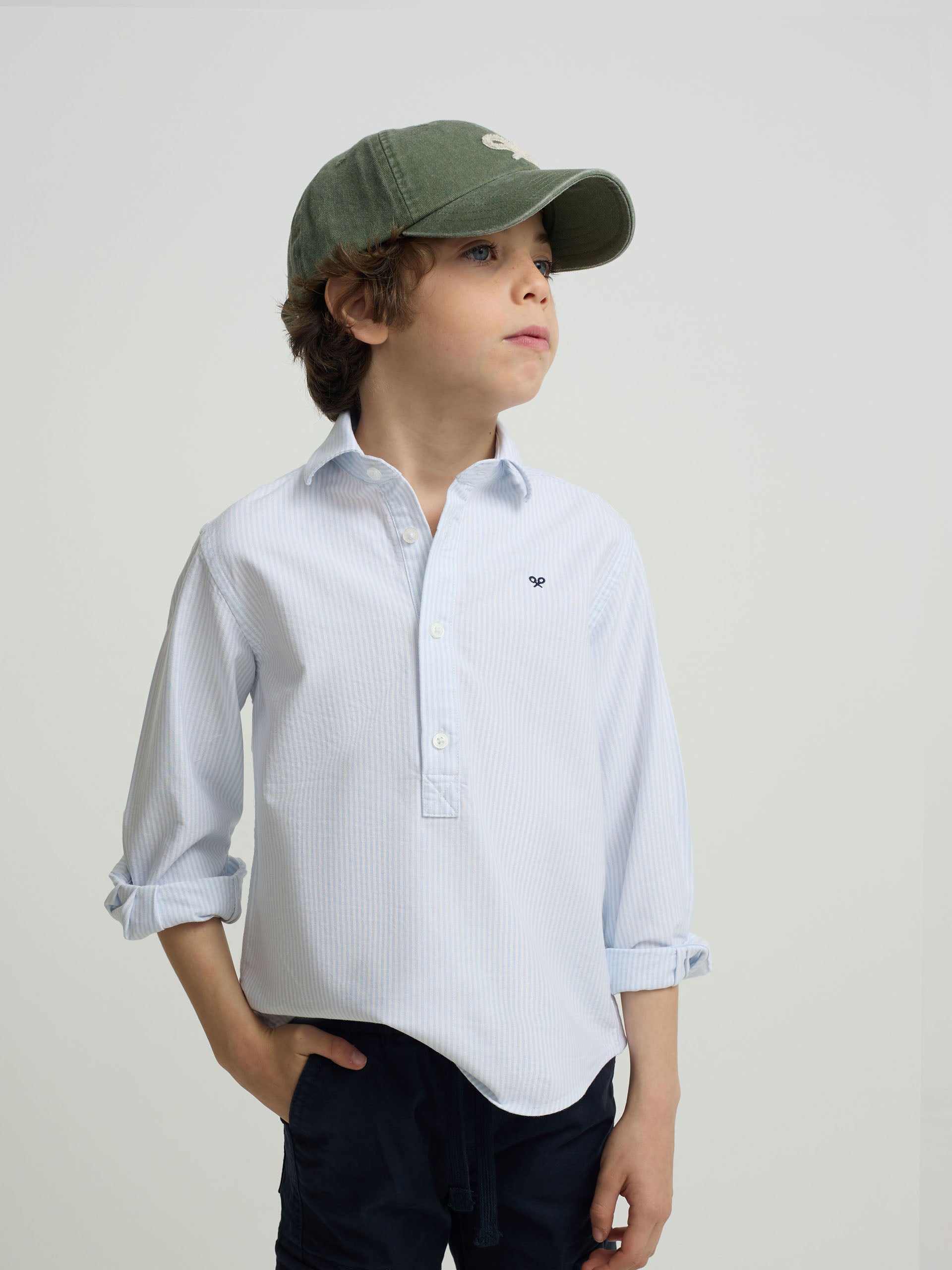Kids' sport polo with blue vertical stripes