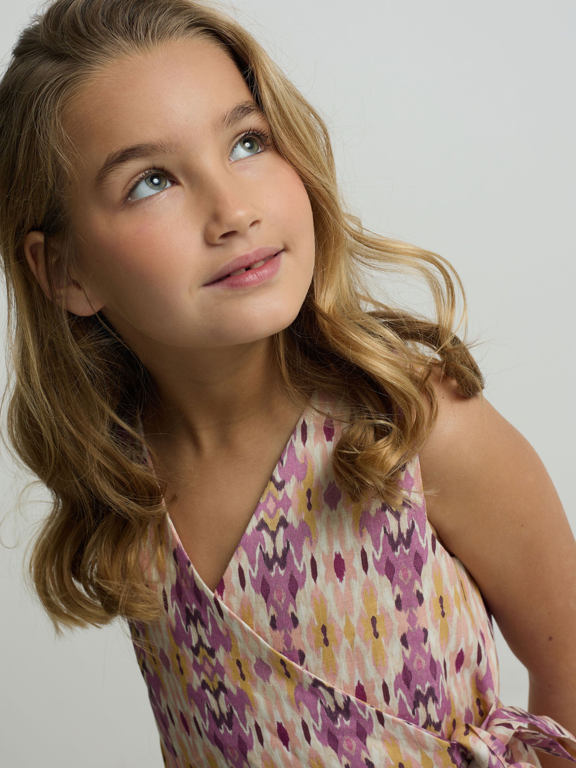 Girl's linen vest with ikat rose print