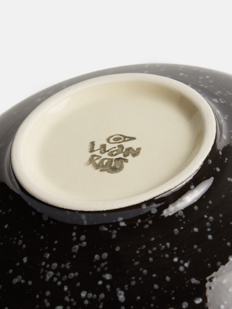 Assiette creuse en céramique émaillée bicolore