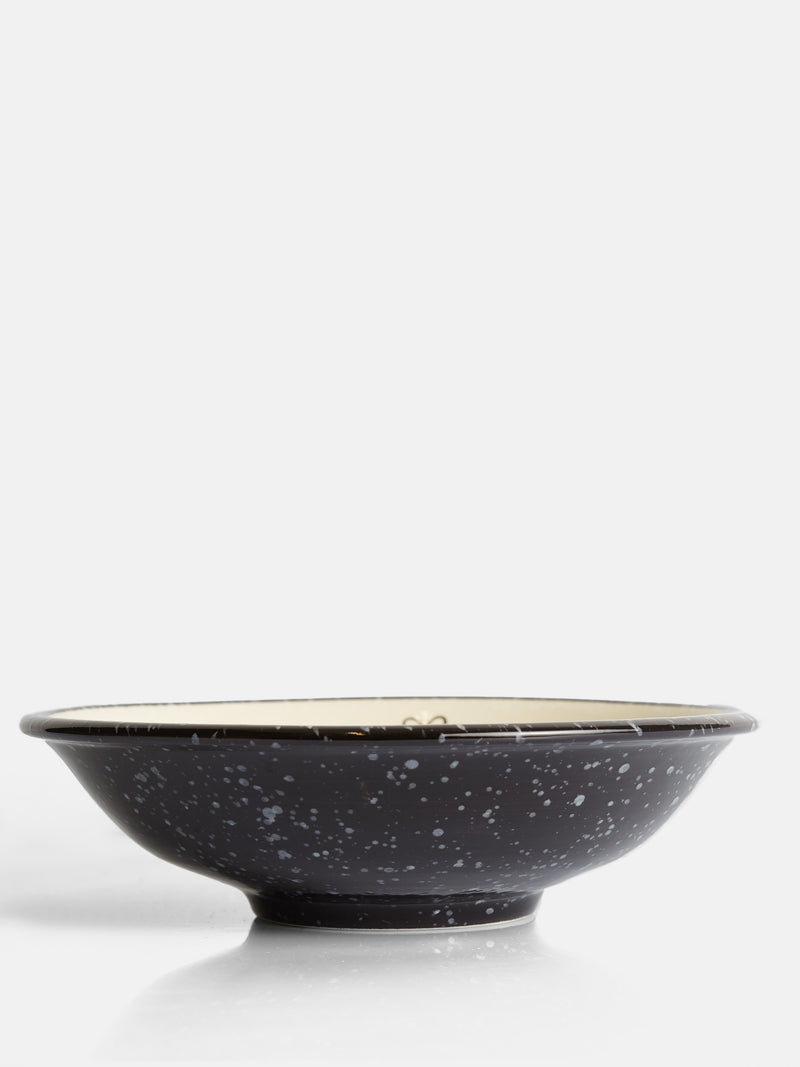 Assiette creuse en céramique émaillée bicolore