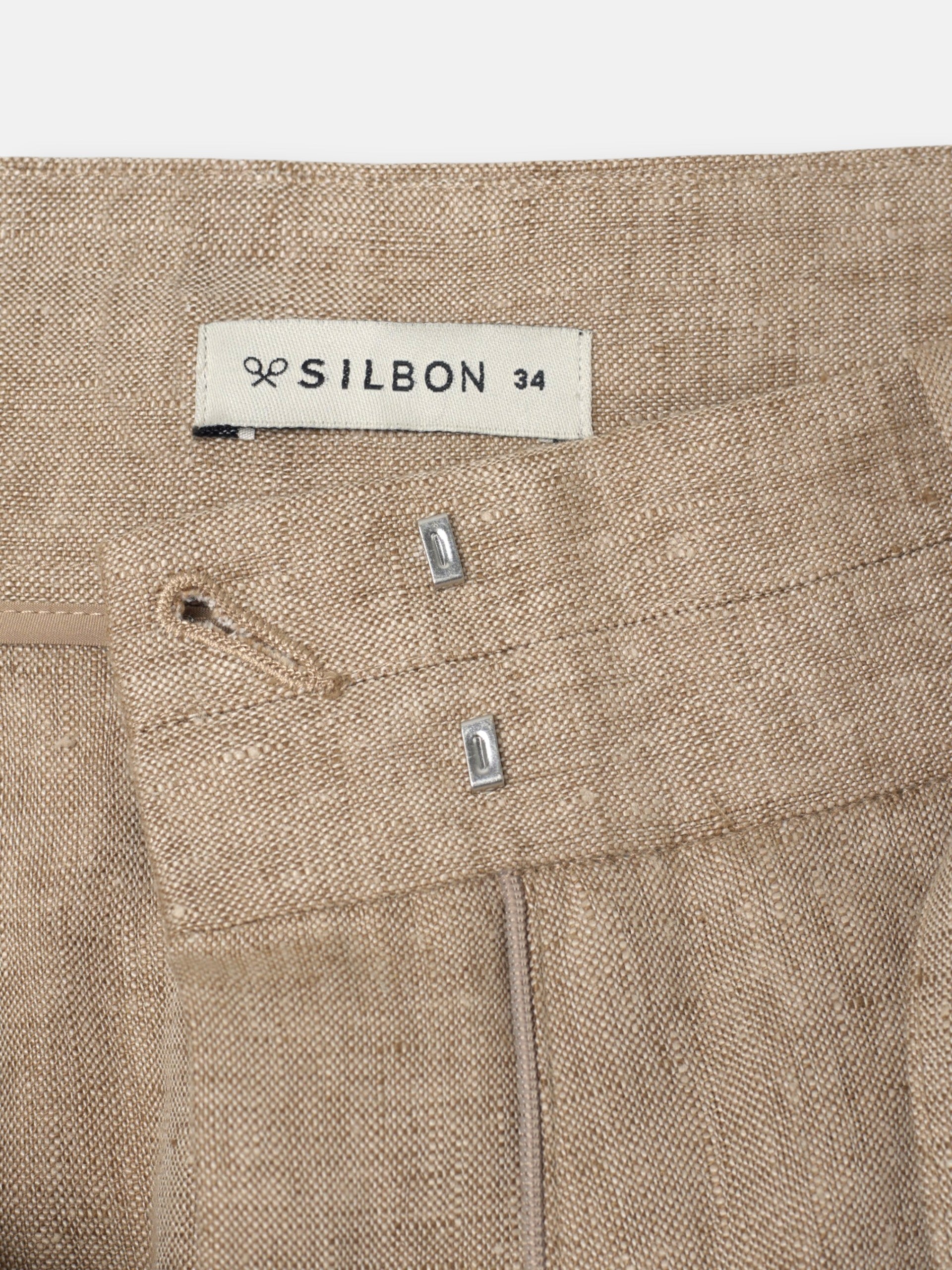 Straight beige trousers with slits