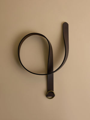Dark brown leather belt with round buckle