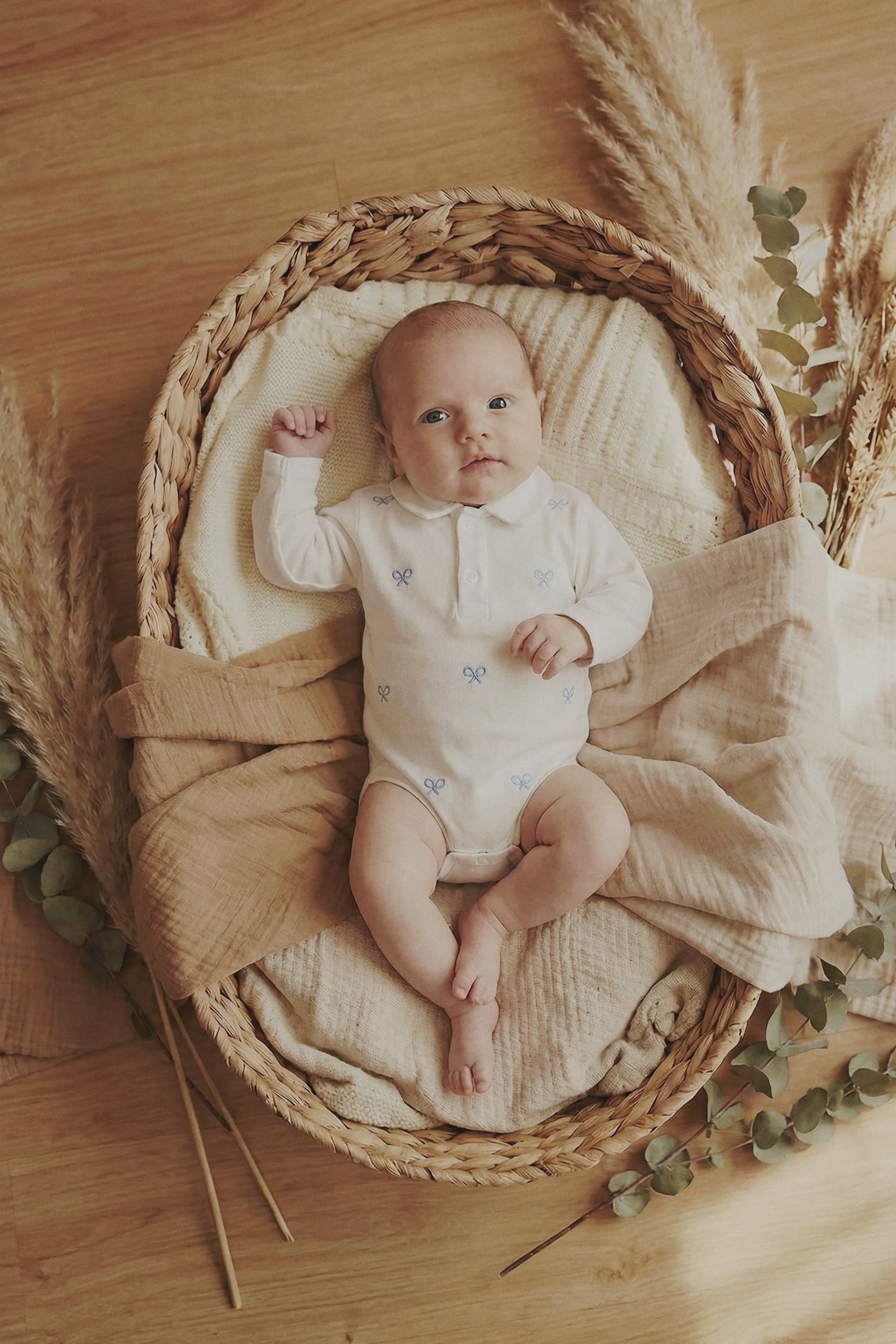 Long-sleeve baby bodysuit with multiracket sky blue