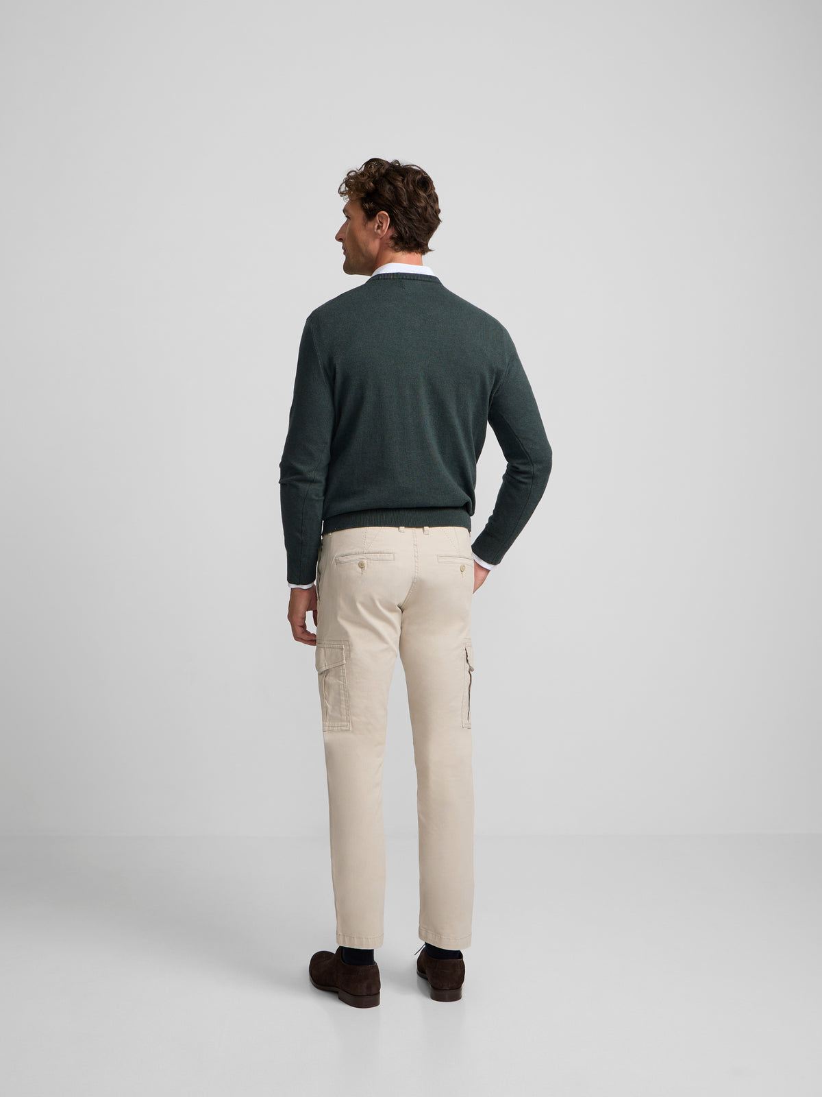Green V-neck sweater