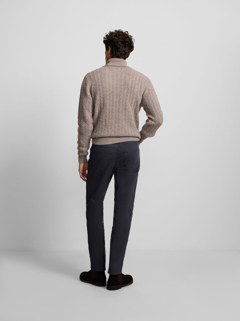 Jersey cuello vuelto de ochos beige