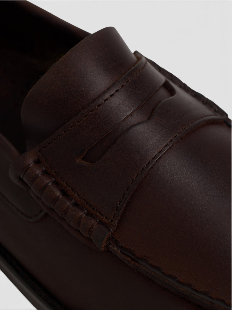 Brown leather loafer shoe