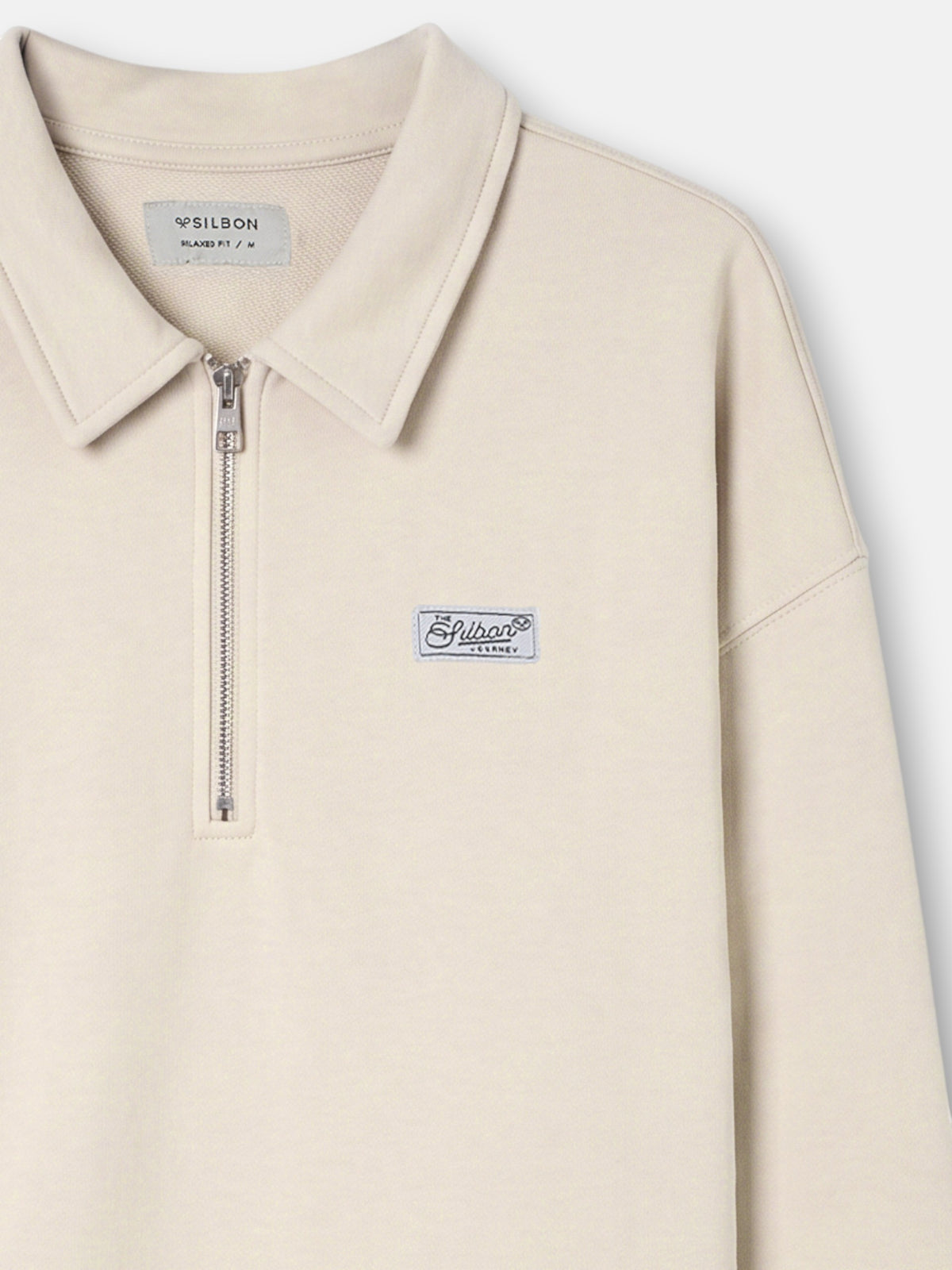 Sudadera relaxed fit media cremallera etiqueta crema