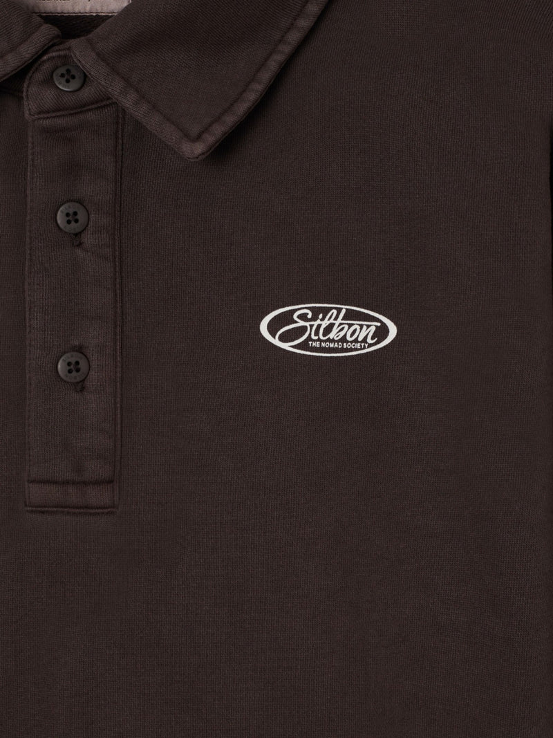 Worn brown polo neck sweatshirt