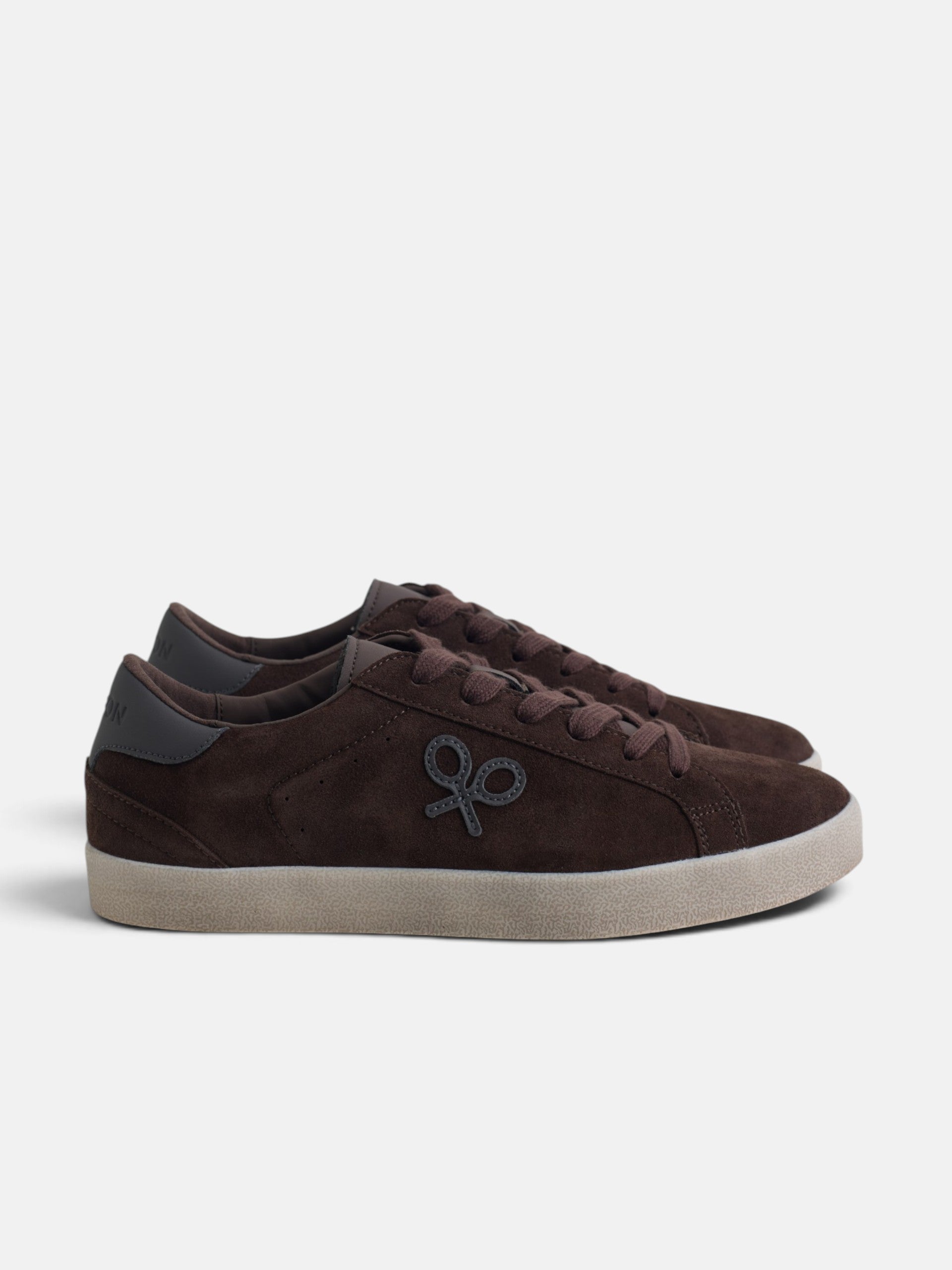 Worn brown suede sneaker