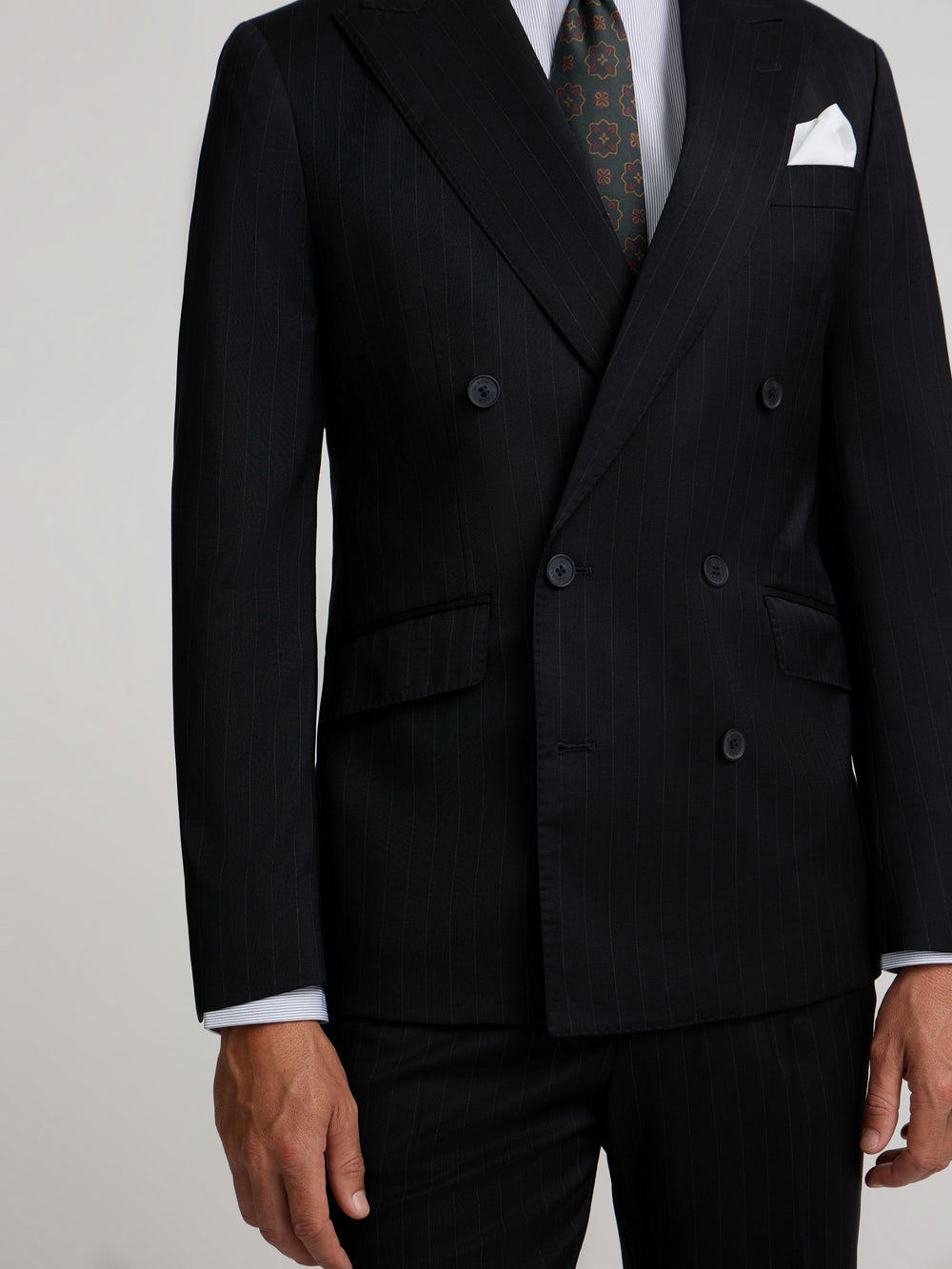 Navy blue pinstripe double-breasted suit jacket
