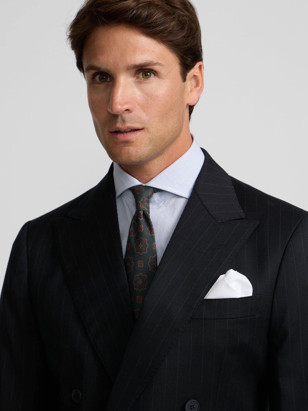 Navy blue pinstripe double-breasted suit jacket
