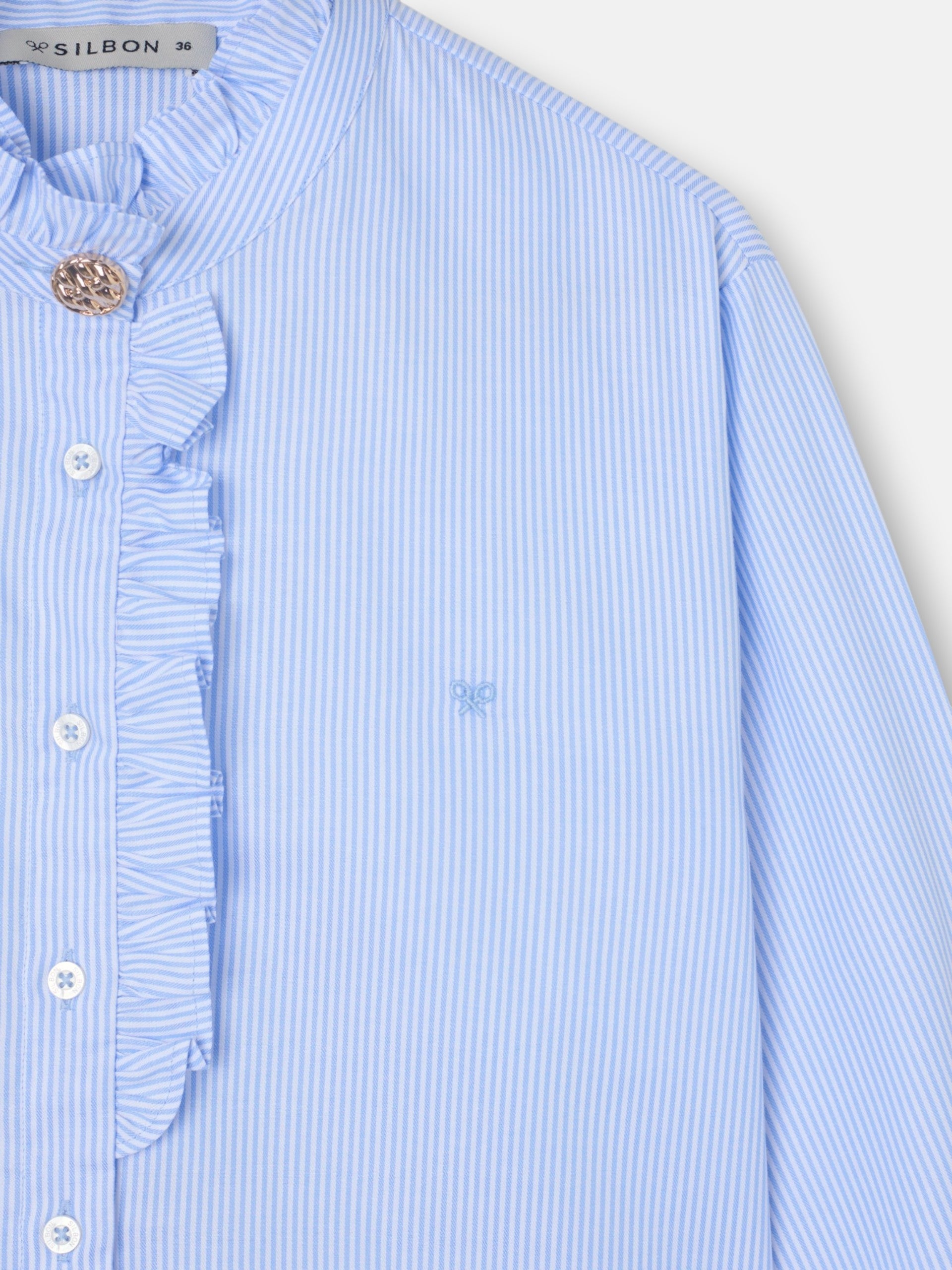 Camisa cuello volante detalle puño rayas celeste