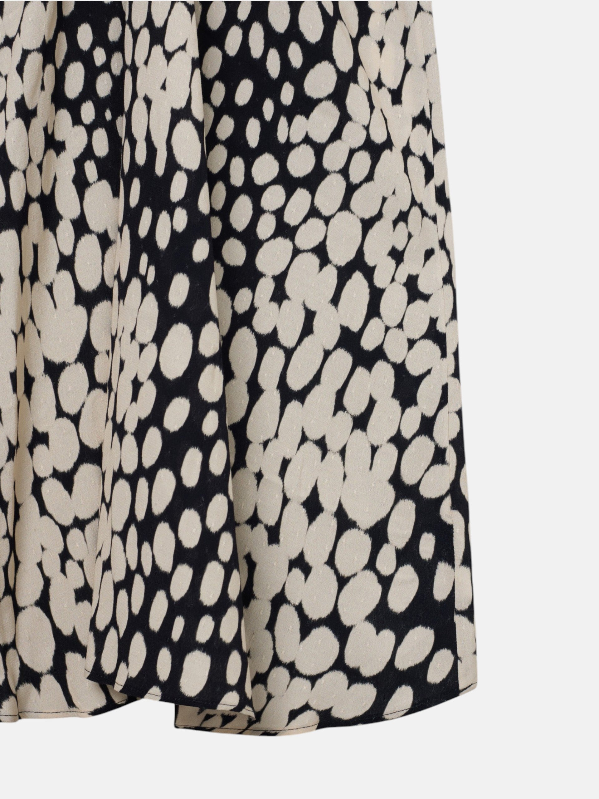 Robe midi drapée à pois blanc et noir