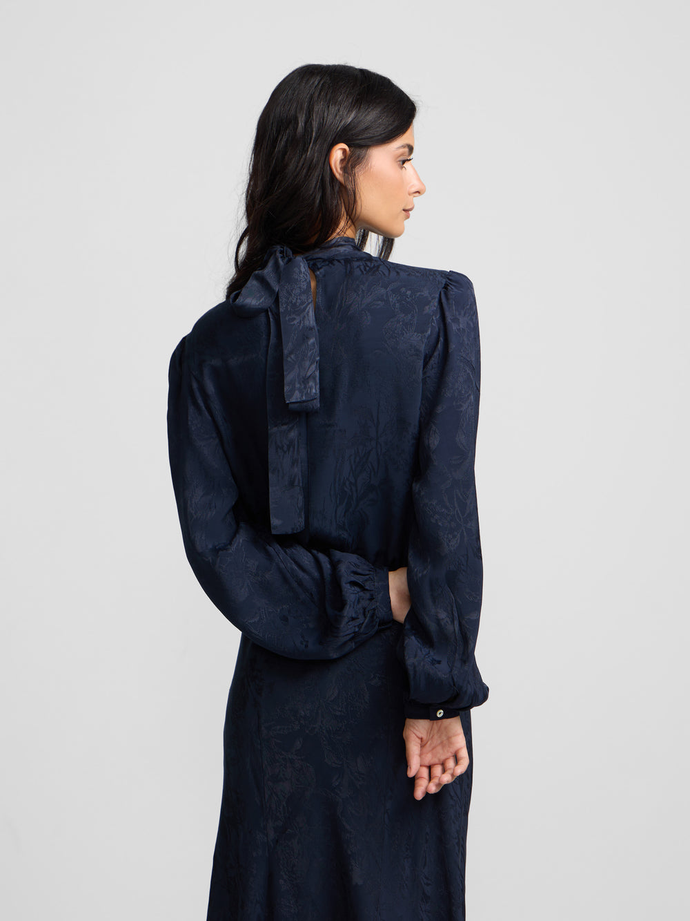 Blue jacquard neck strap blouse