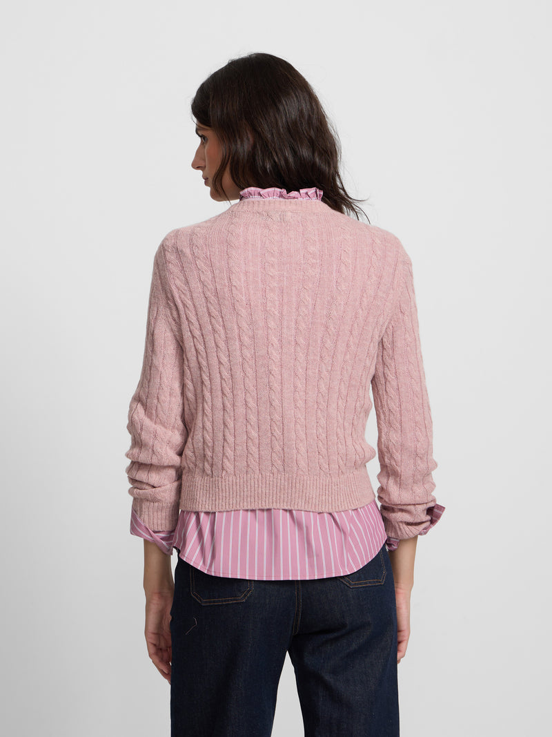 Pull torsadé à col rond rose