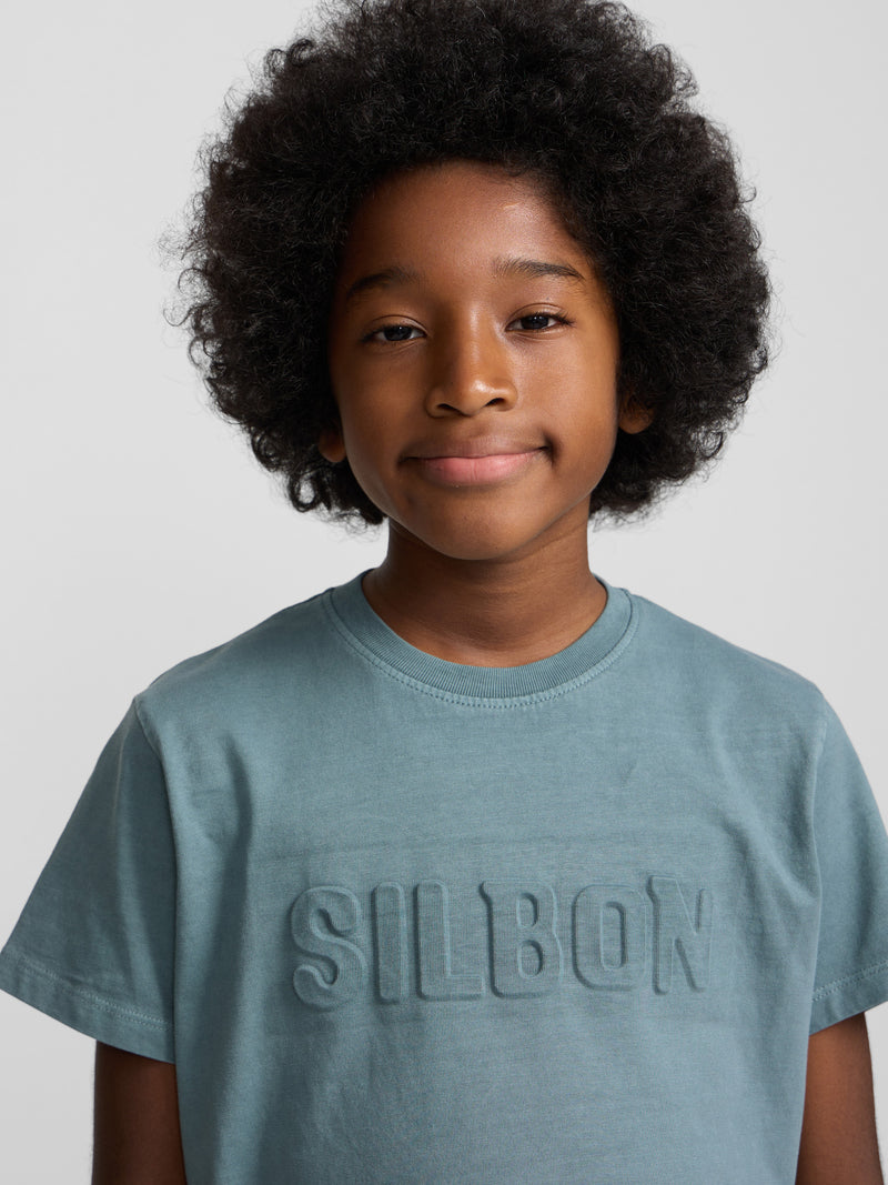 Camiseta kids garment dye verde