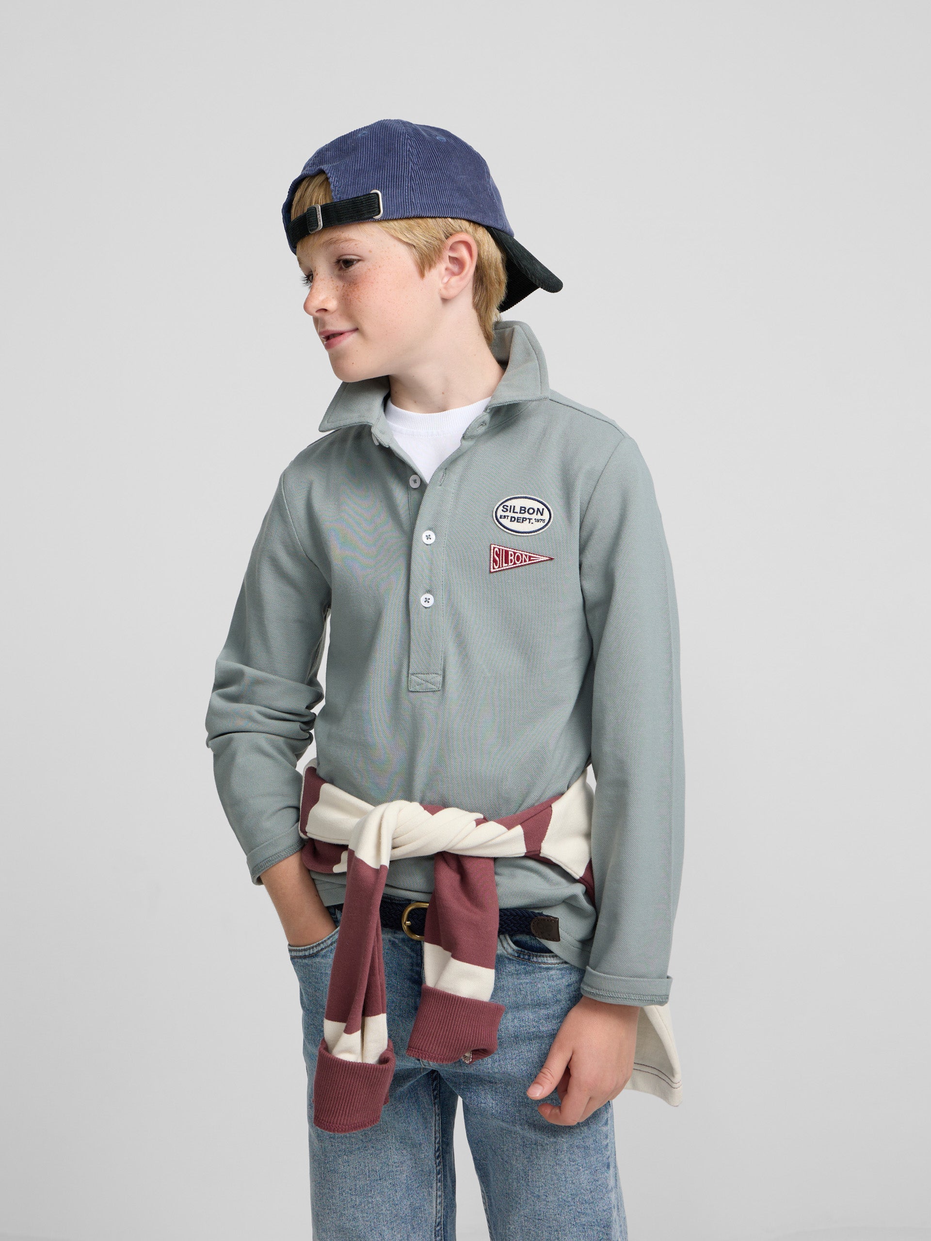 Green kids' polo with patches