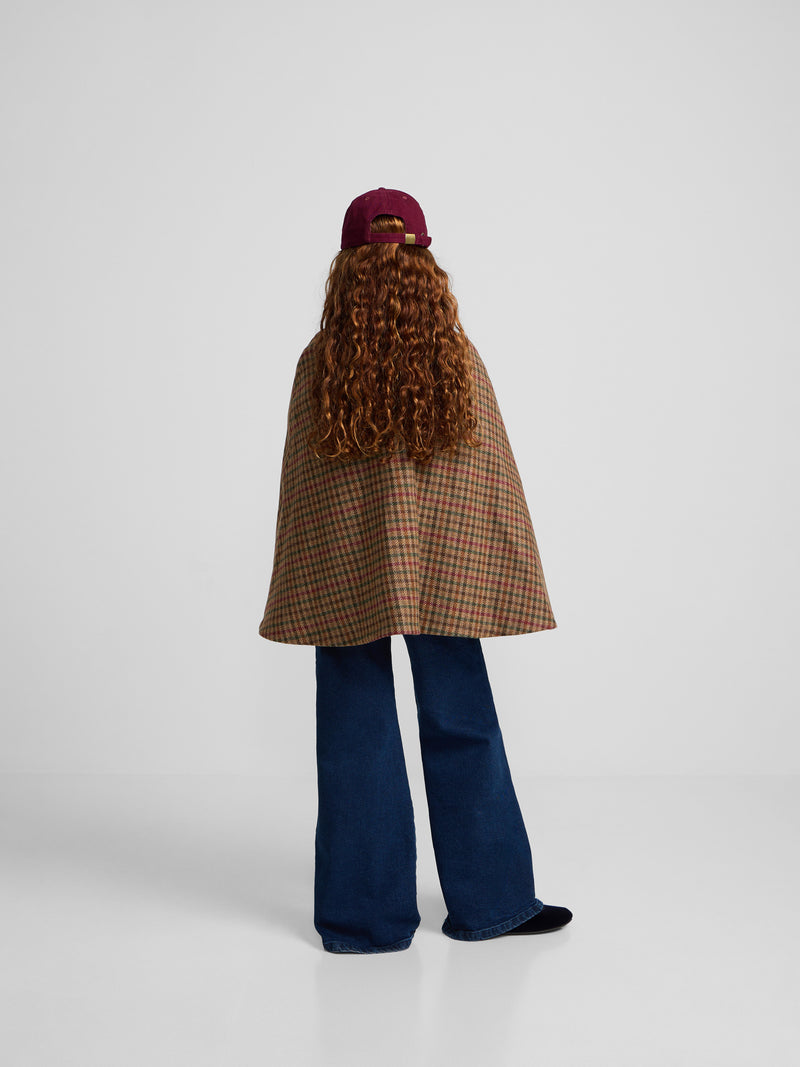 Girl's brown checkered cape