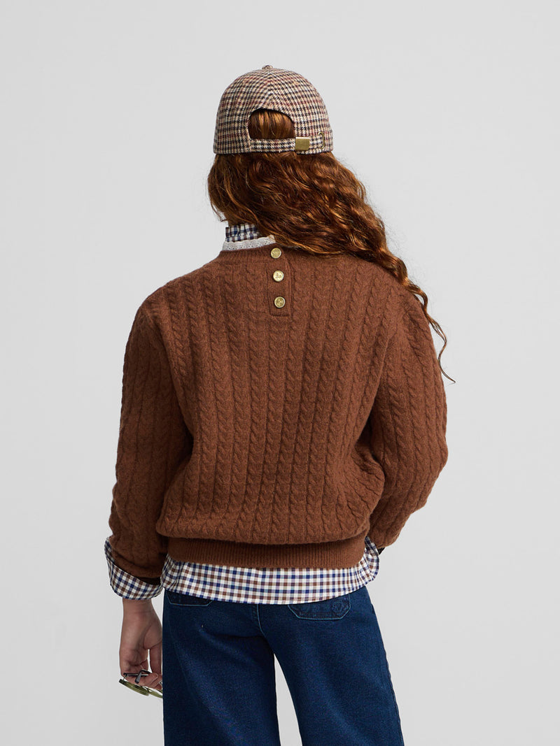 Brown cable knit girl's sweater with ruffled collar