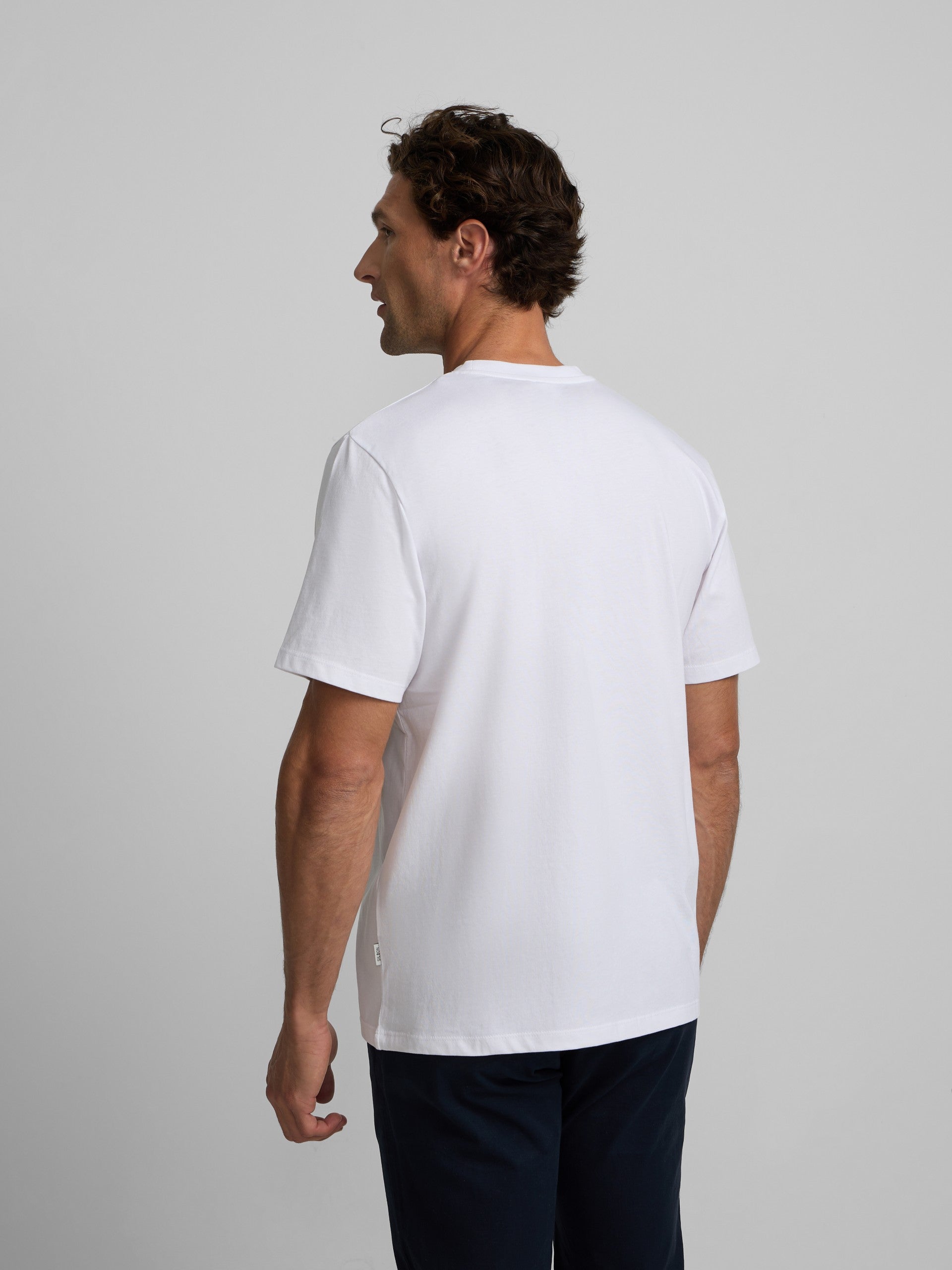 Plain white t-shirt with mini logo patch