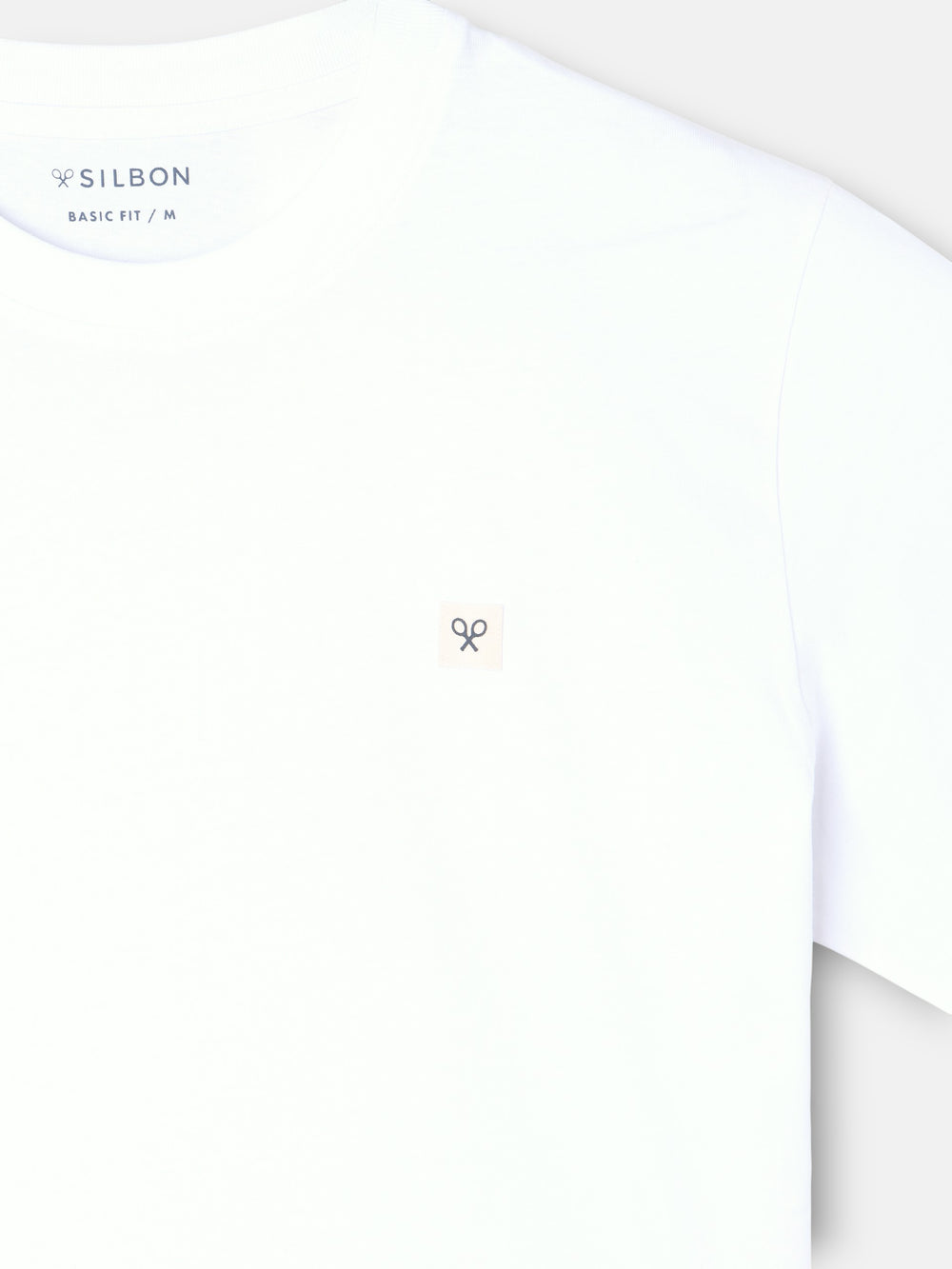 Camiseta lisa minilogo parche blanca
