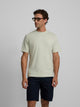 Plain T-shirt with light green mini logo patch