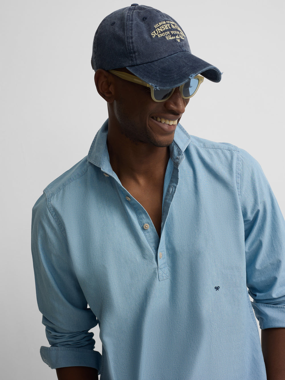 Polera sport denim azul claro