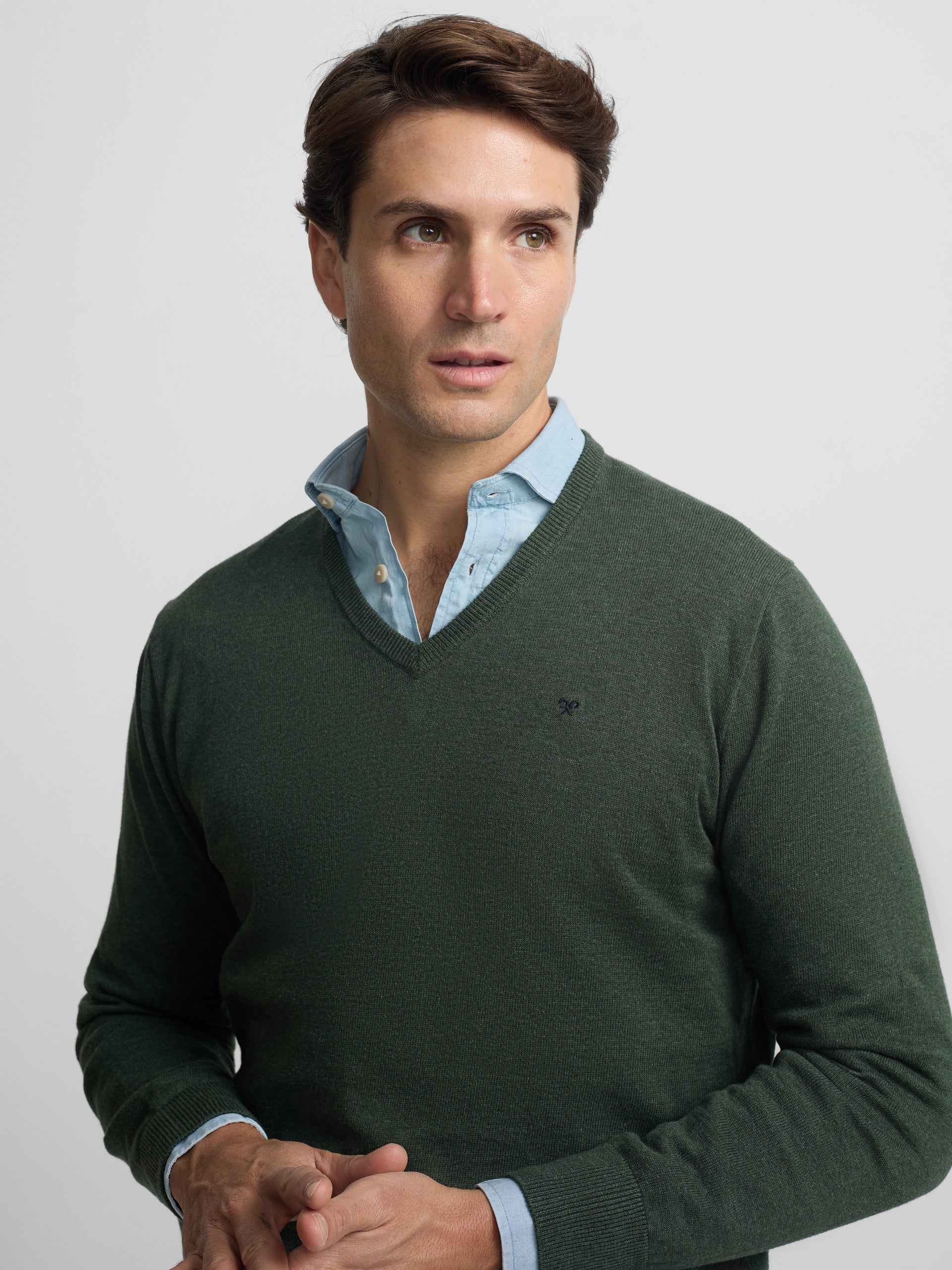 Dark green plain V-neck sweater