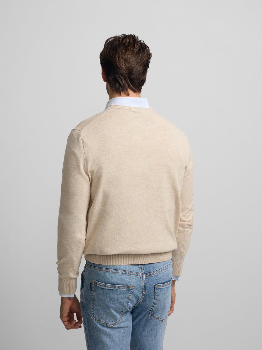 Jersey liso cuello pico crema