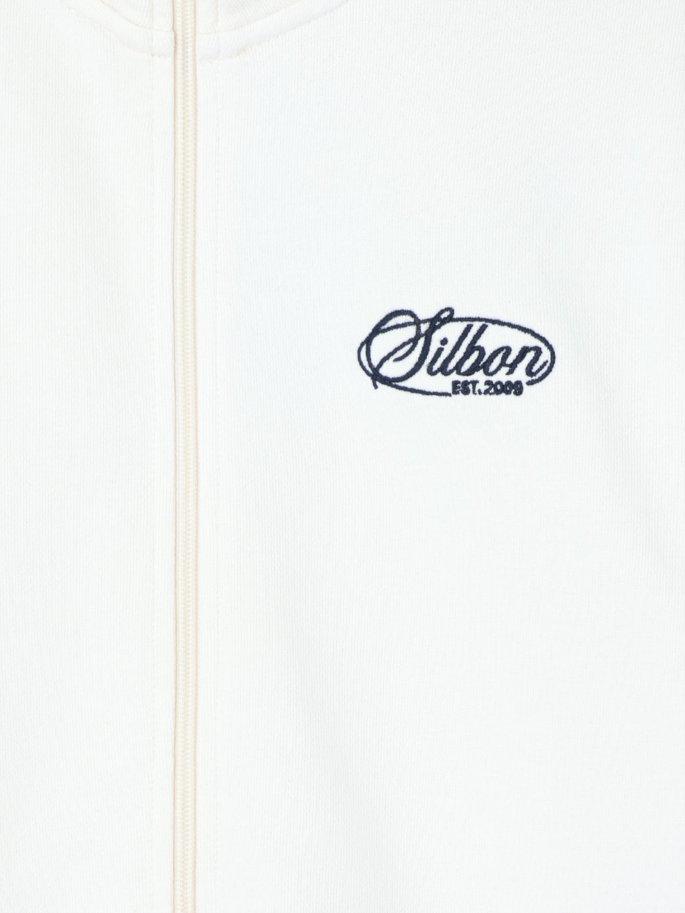 Sudadera cremallera bordado crema