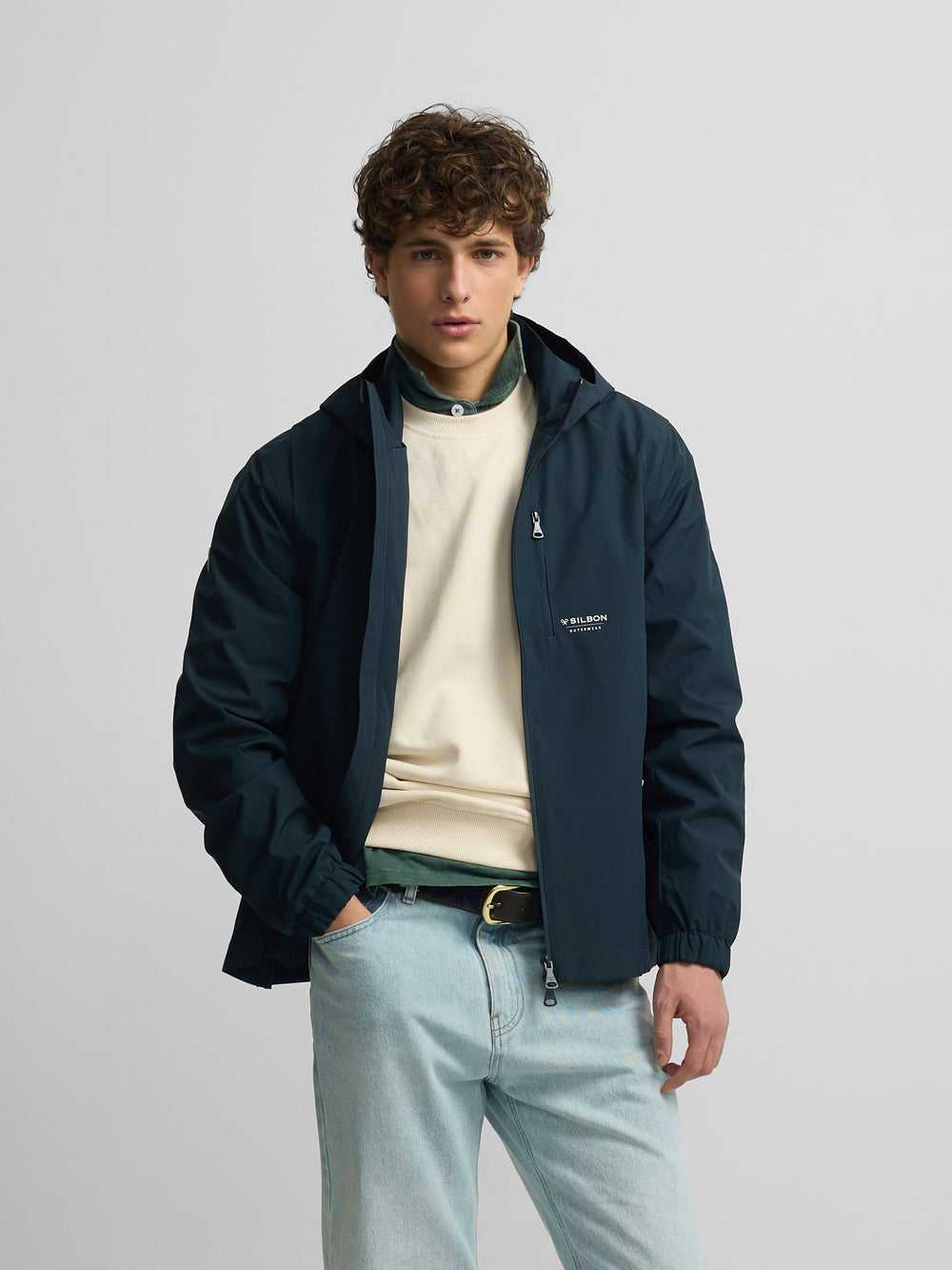 Technical windbreaker with navy blue hood