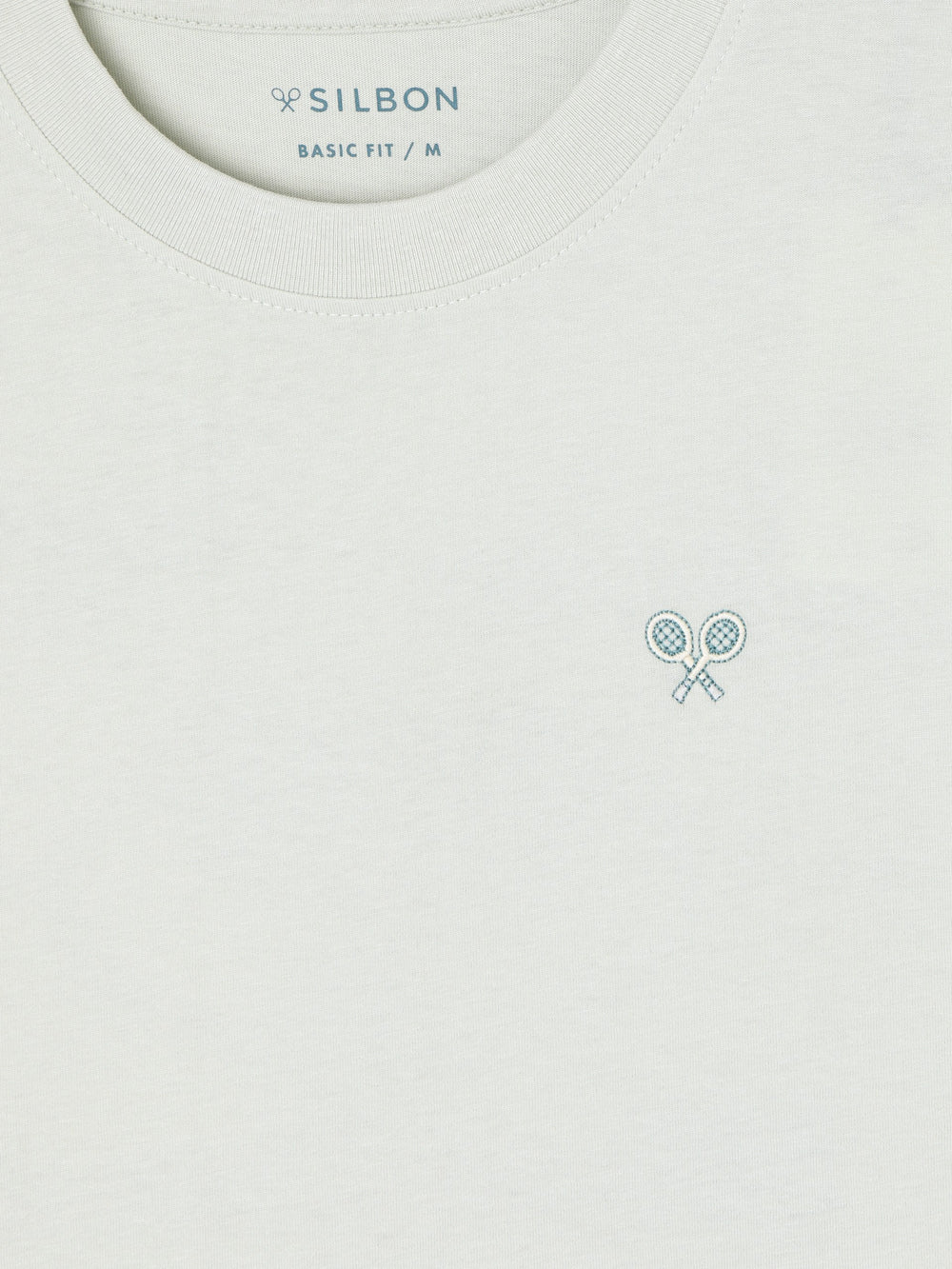 T-shirt apres ténis verde claro