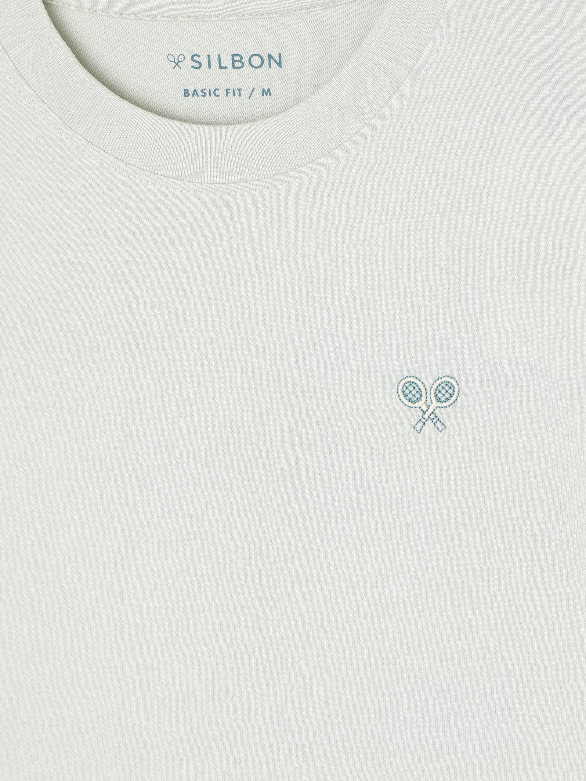 T-shirt après tennis vert clair