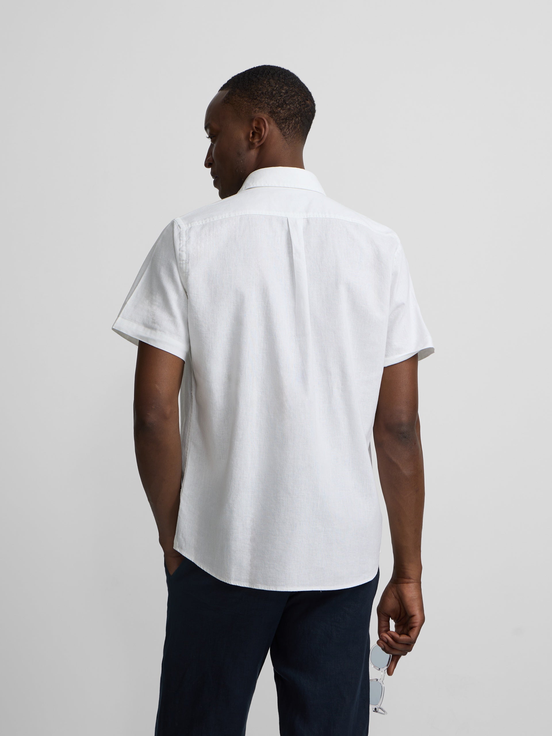 White short-sleeved linen shirt