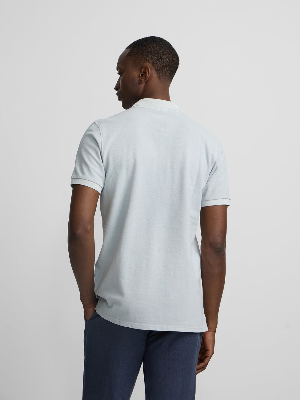 Polo clasico garment dye azul claro