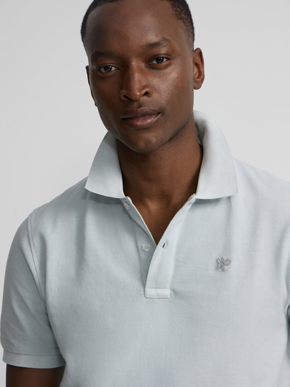 Polo clasico garment dye azul claro