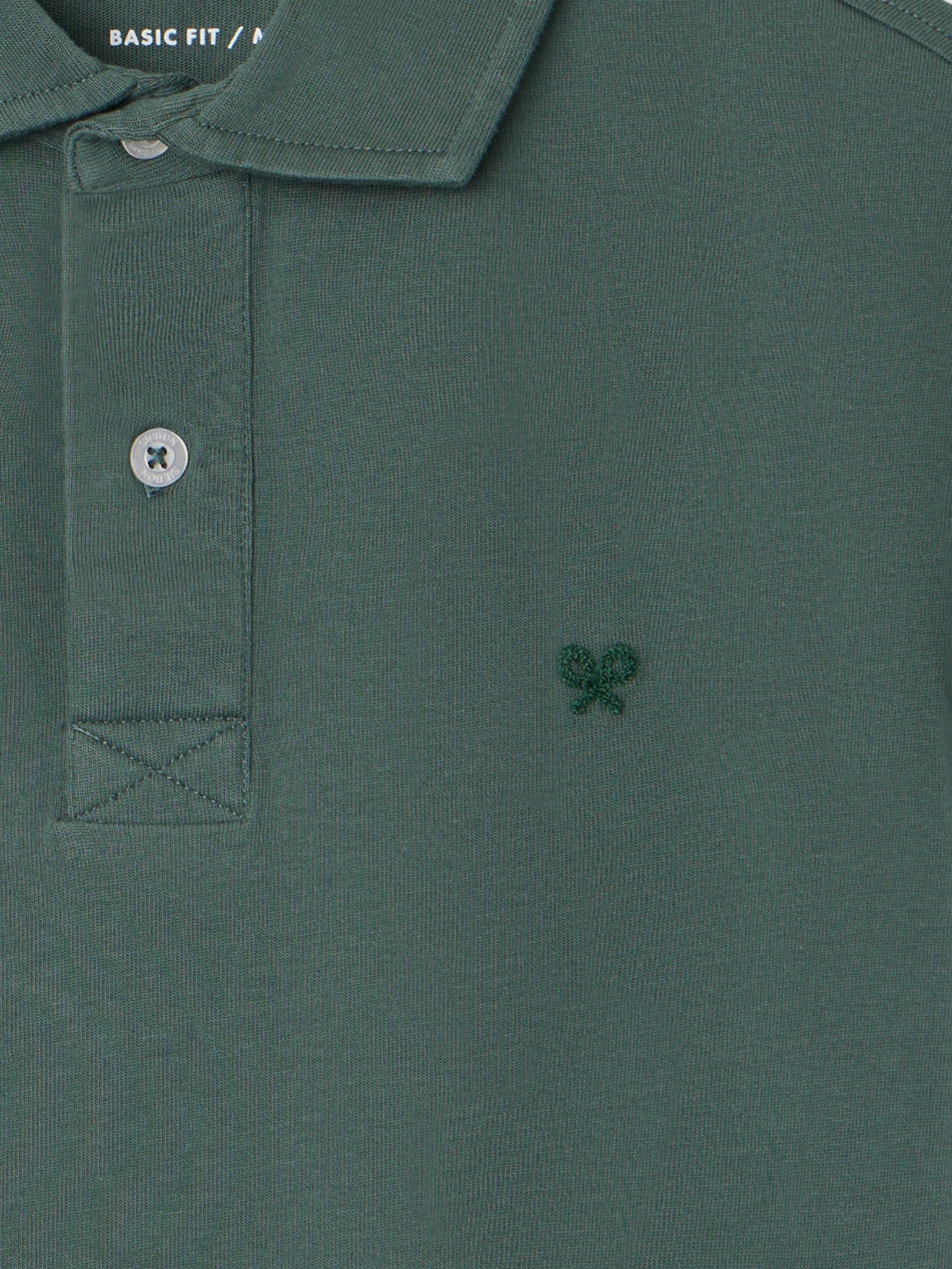 Polo manga corta logo relieve verde