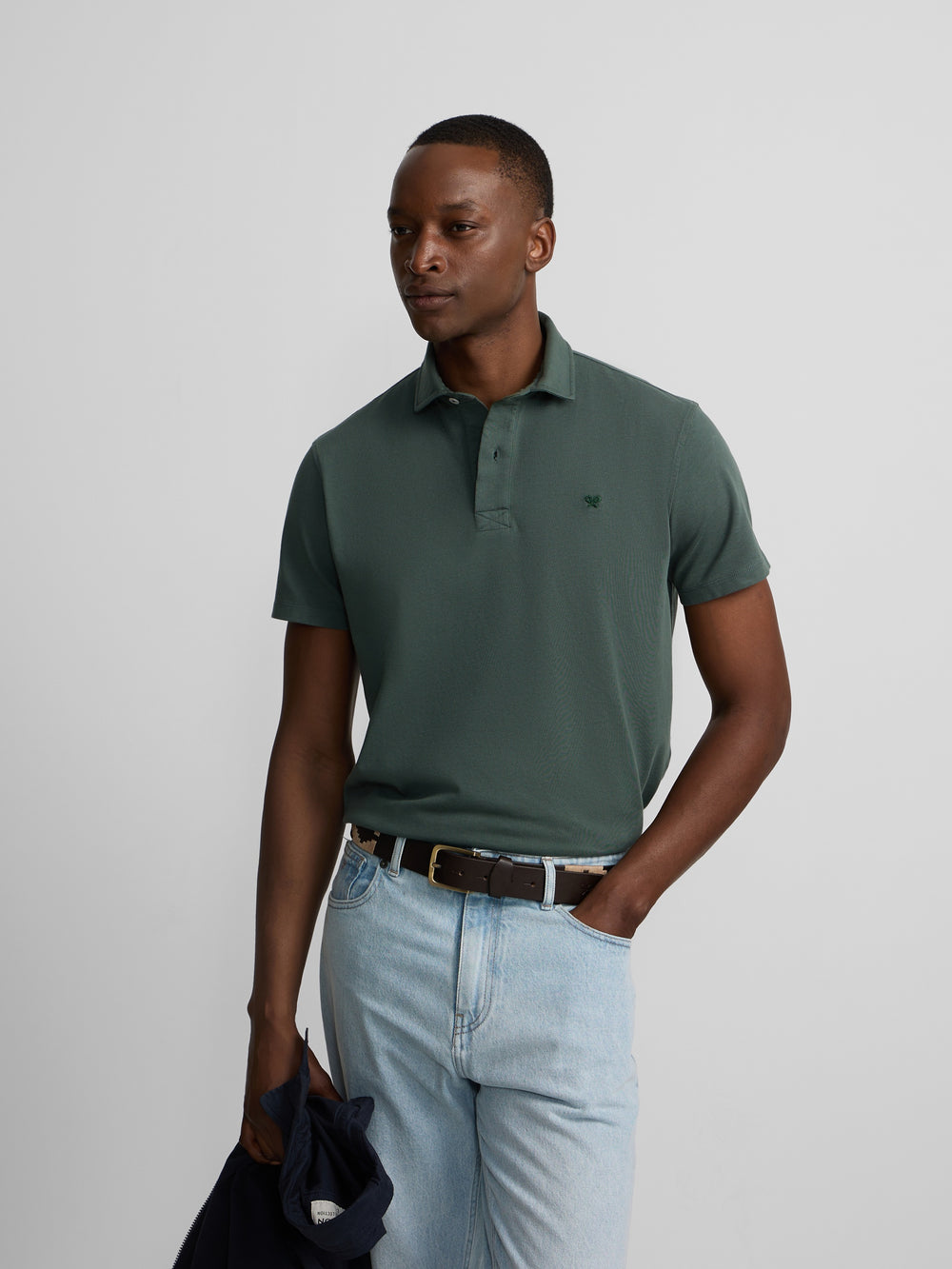 Polo manga corta logo relieve verde