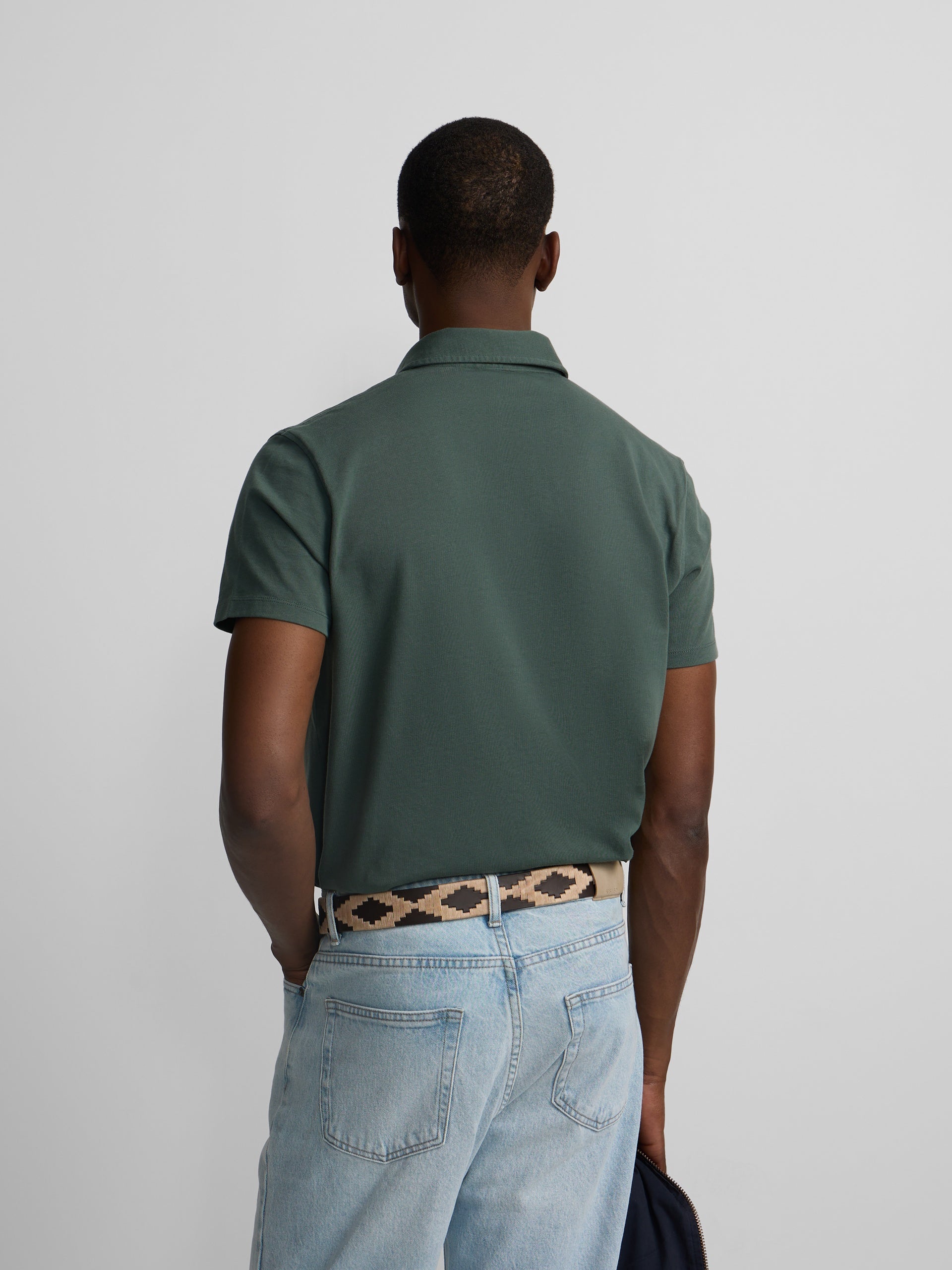 Polo manga corta logo relieve verde