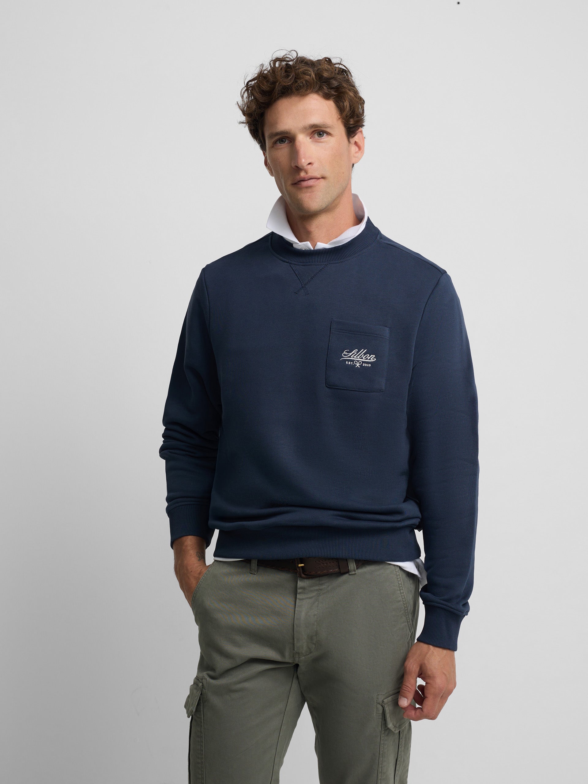 Navy blue sweatshirt with embroidered pocket