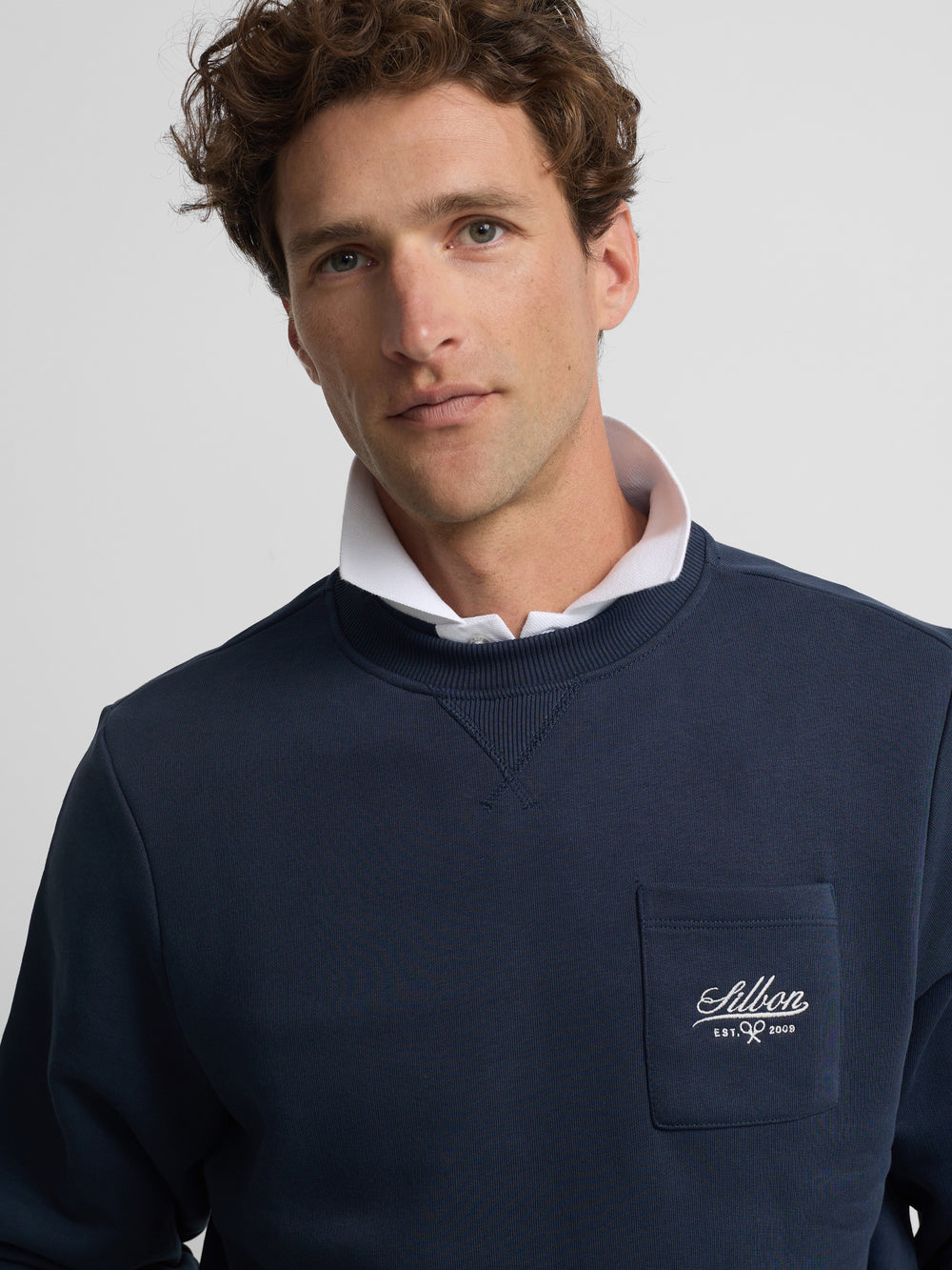 Sudadera bolsillo bordado azul marino