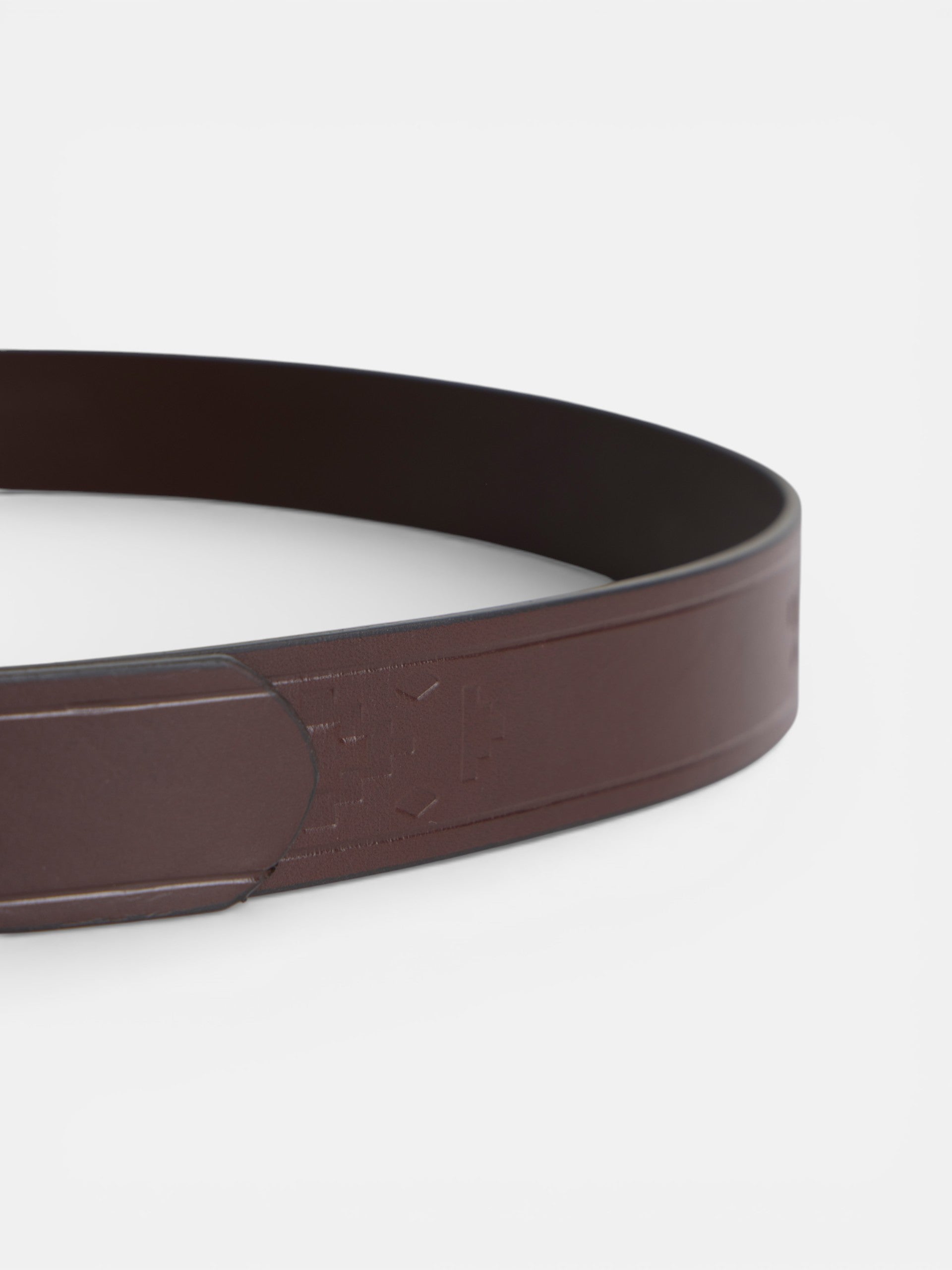 Leather belt with ethnic engravings