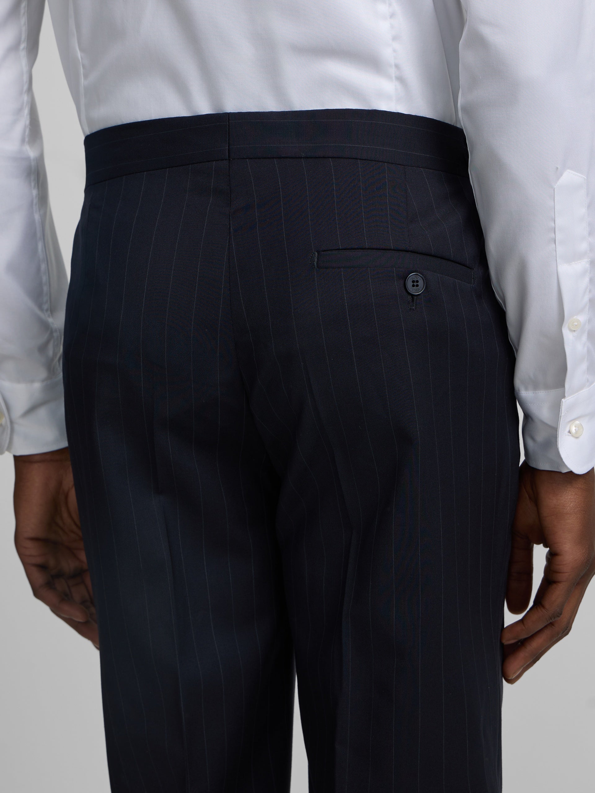 Navy blue pinstripe suit trousers