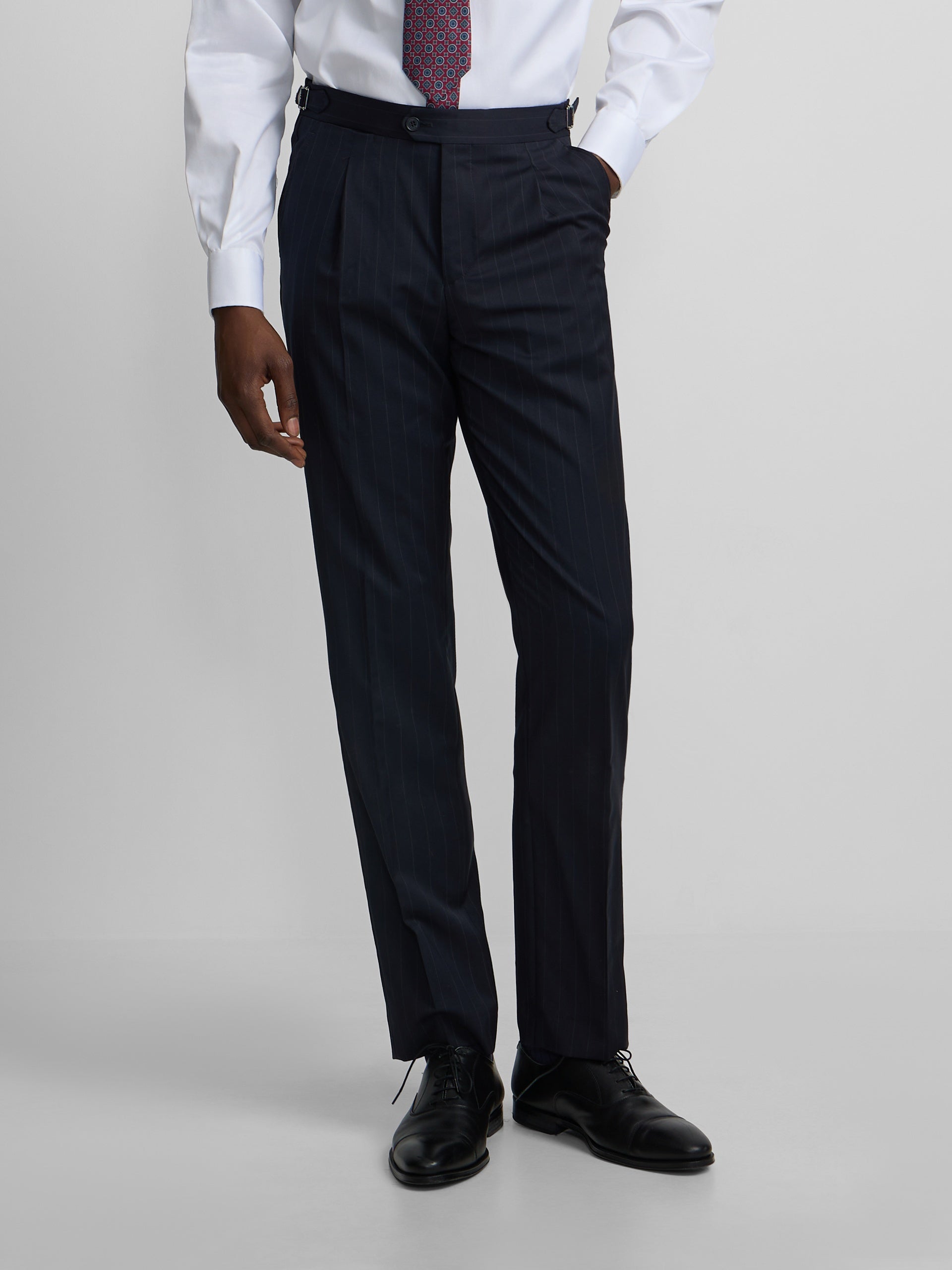 Navy blue pinstripe suit trousers