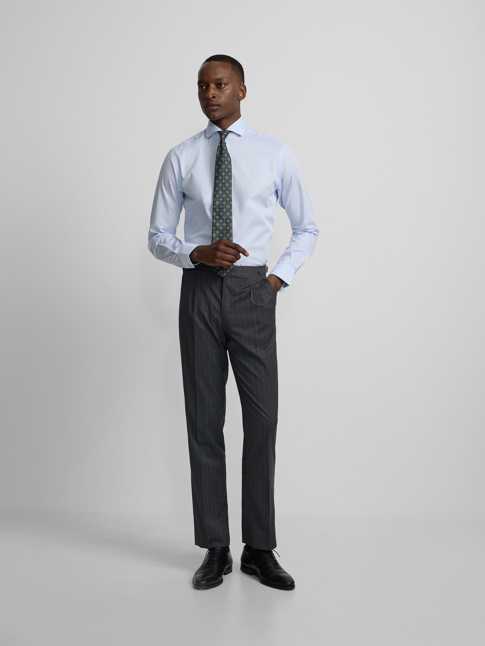 Grey pinstripe double-breasted suit trousers
