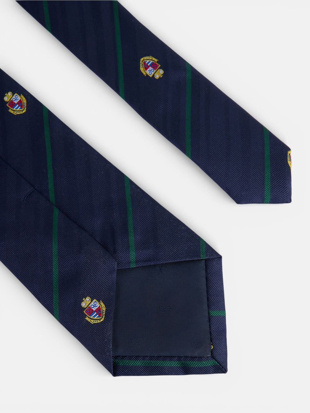 Navy blue striped tie with crests