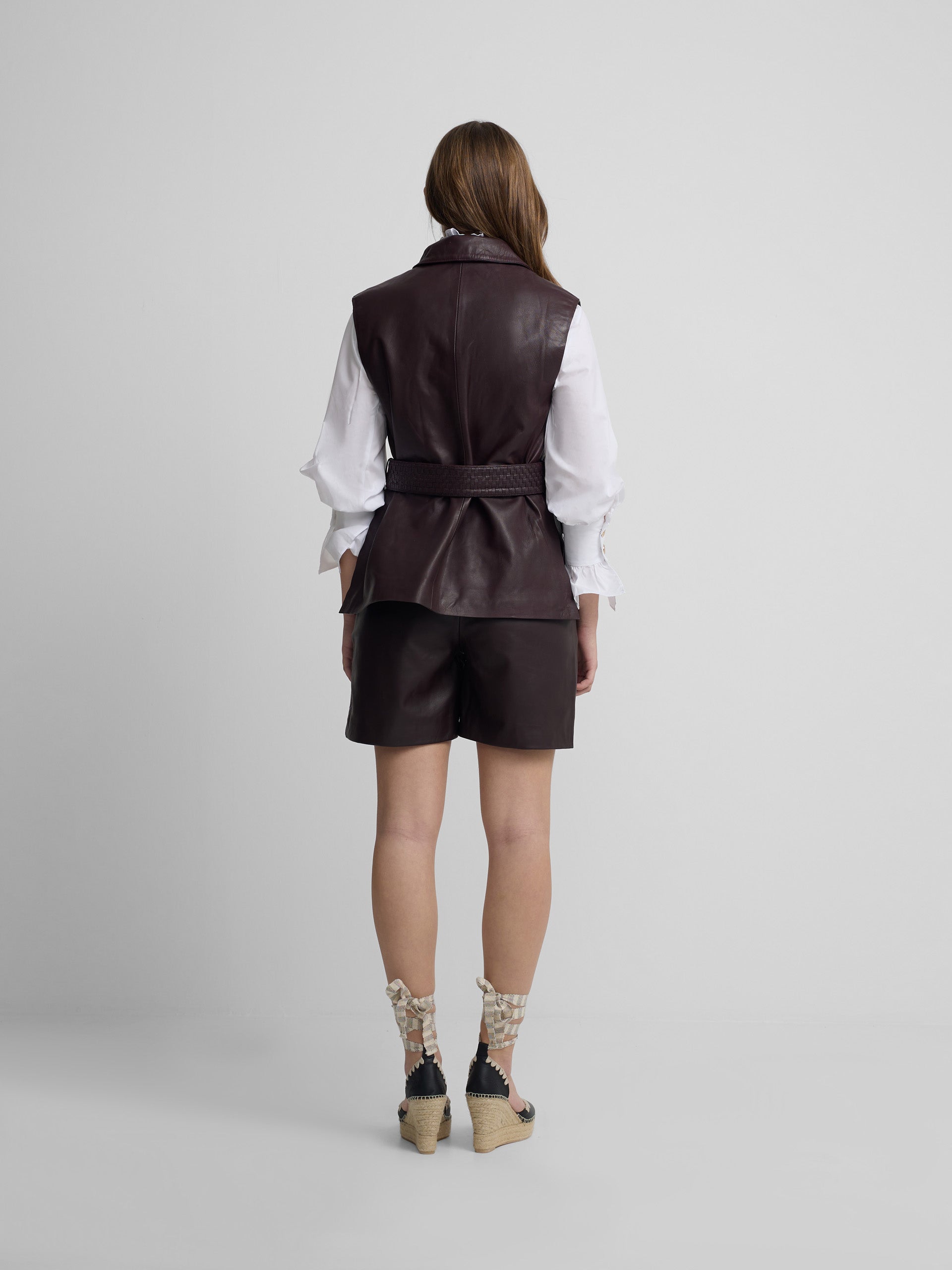 Braided burgundy leather vest
